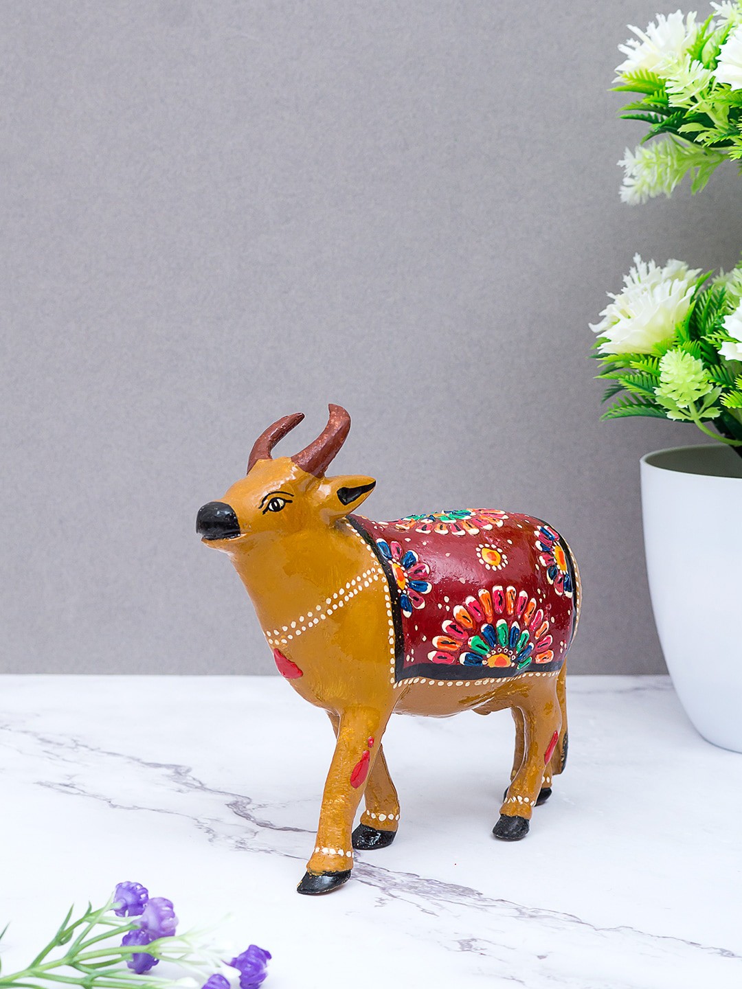 

Golden Peacock Yellow And Red Handcrafted Standing Nandi Showpiece