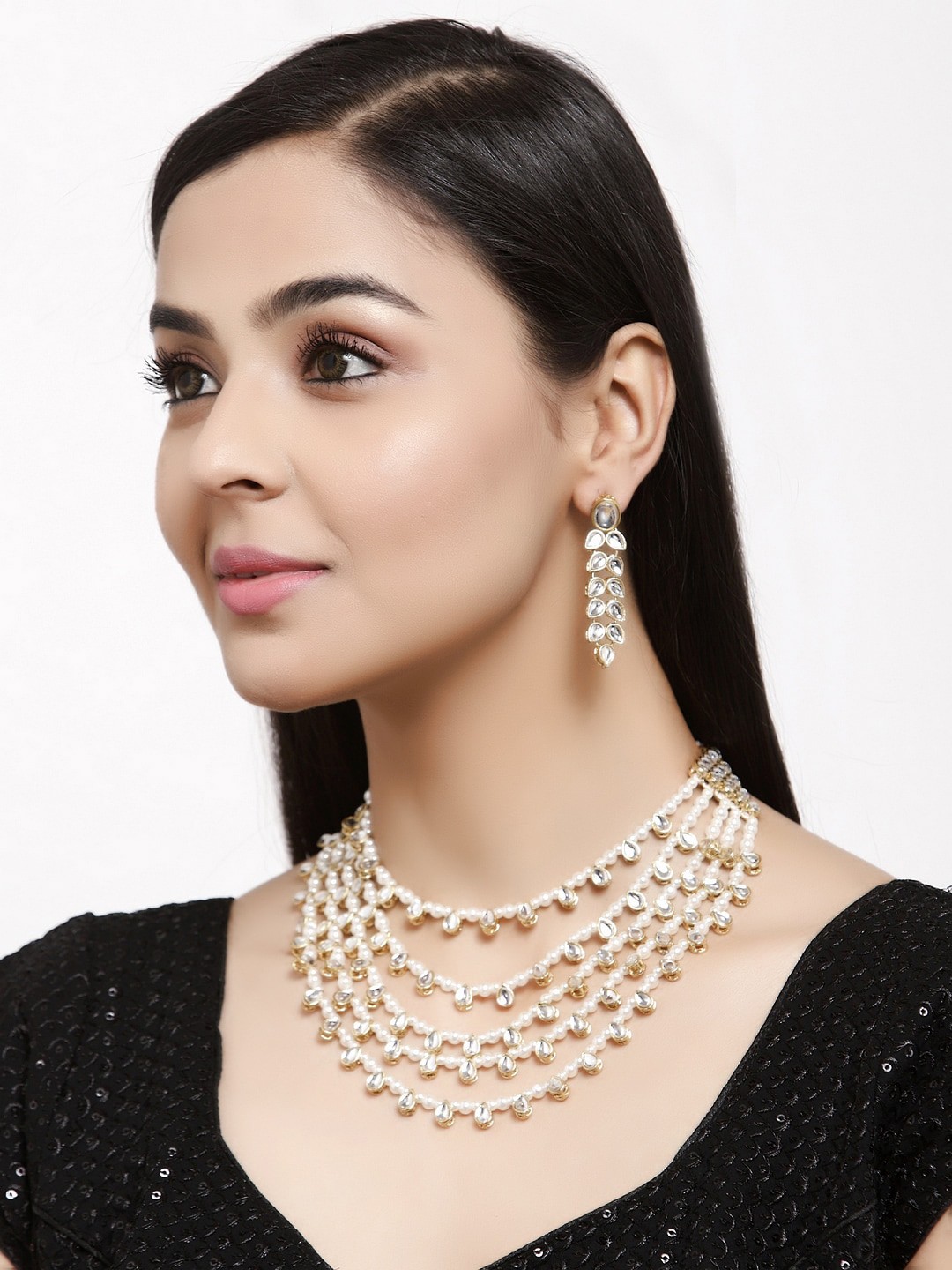 

Shining Diva Gold-Plated & White Kundan Studded & Beaded Multi-Stranded Jewellery Set