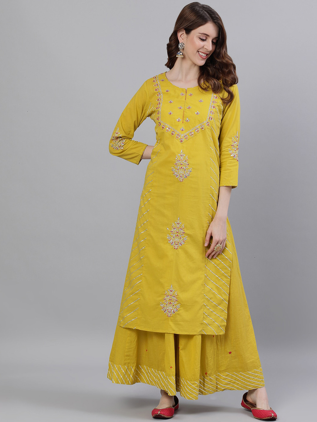 

Ishin Women Mustard Embroidered Kurta with Sharara
