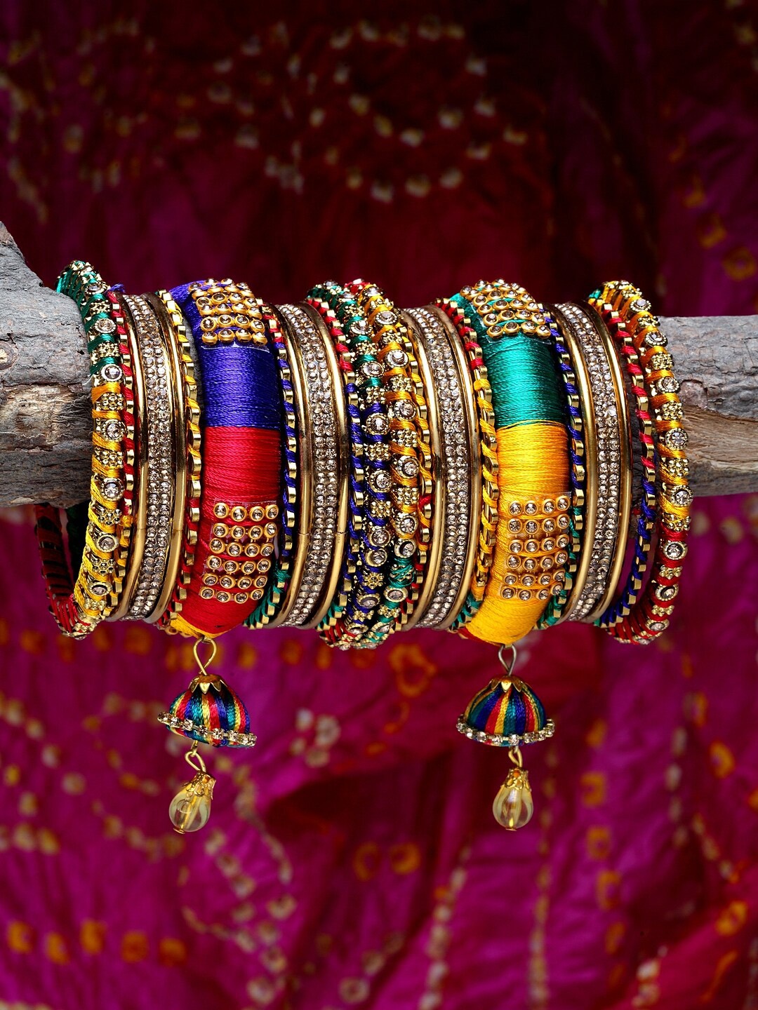 

Shining Diva Set of 18 Gold-Plated Yellow & Red Stone-Studded Antique Bangles