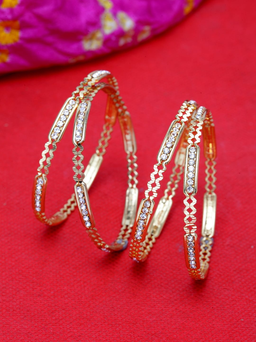 

Shining Diva Set Of 4 Gold-Plated & White Stone Studded Bangles