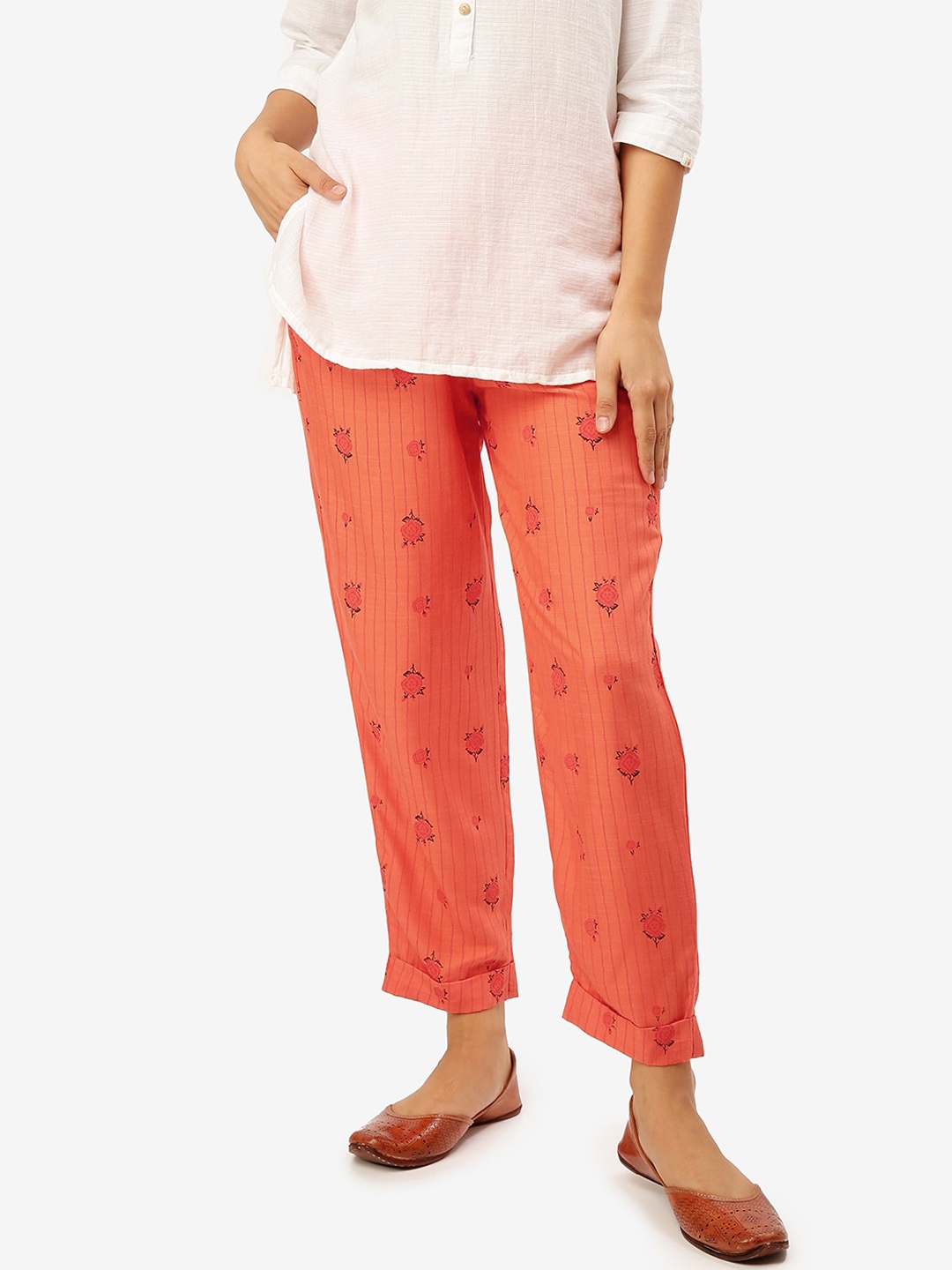 

Saaki Women Orange Regular Fit Printed Regular Trousers