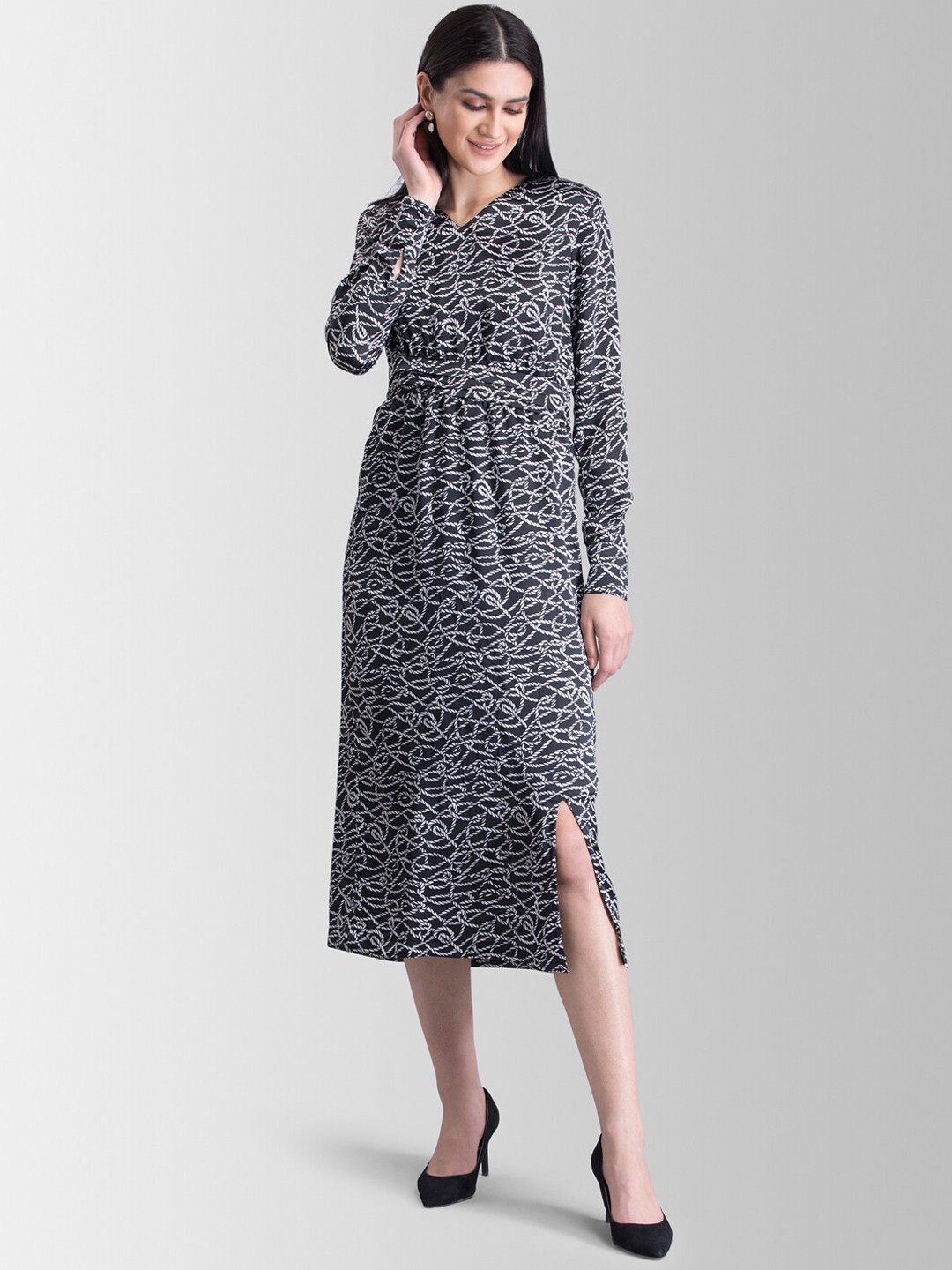 

FableStreet Women Black Printed Fit and Flare Dress