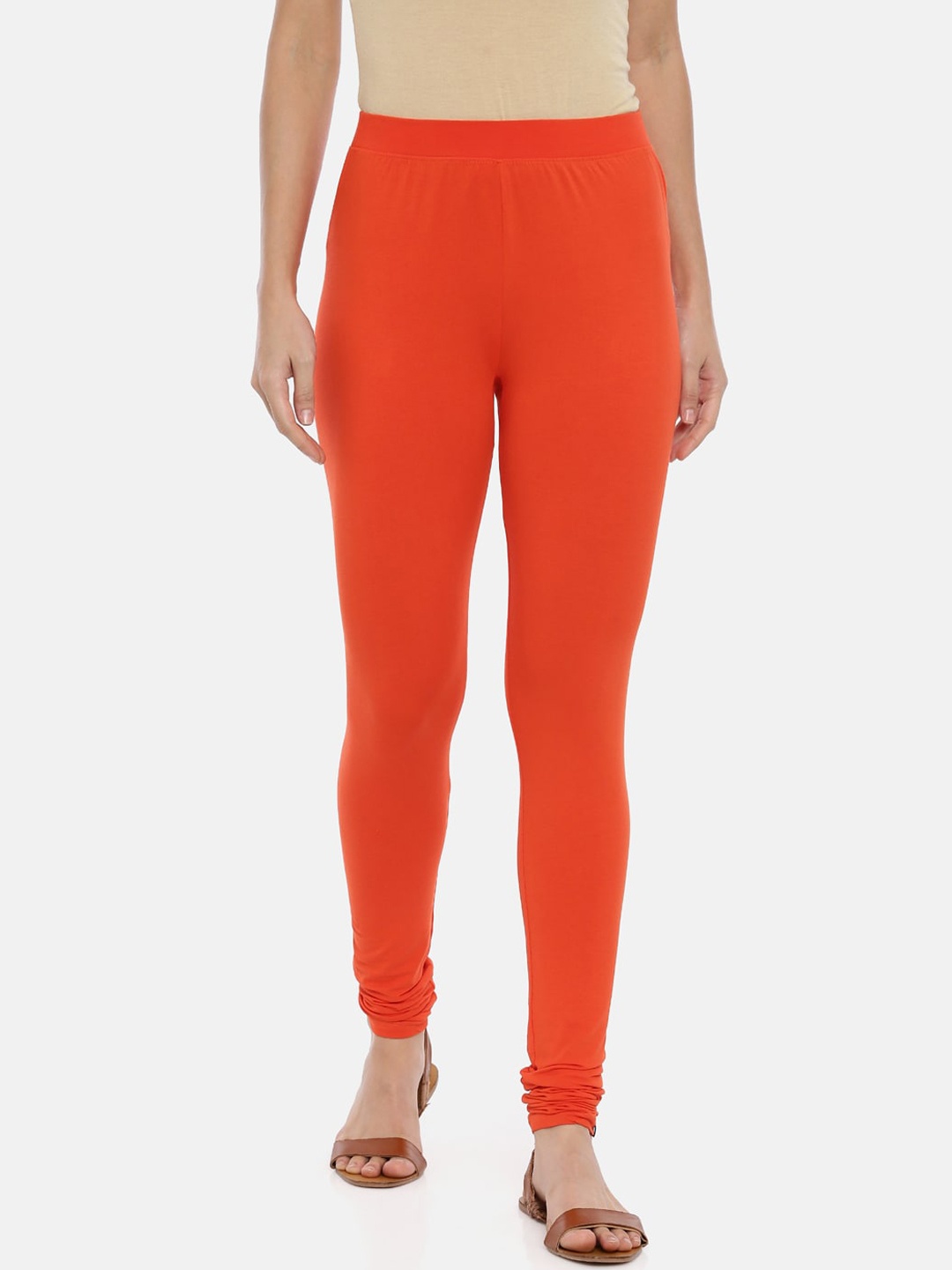 

Huggy Women Orange Solid Churidar-Length Leggings