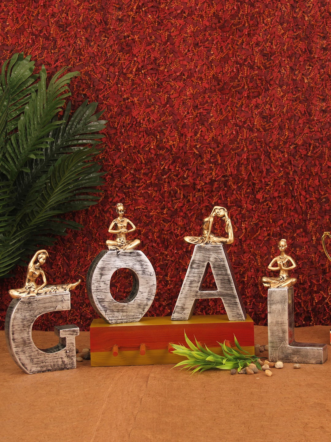 

TIED RIBBONS Set Of 4 Grey & Gold-Toned Goal Sign Symbol Decorative Showpiece