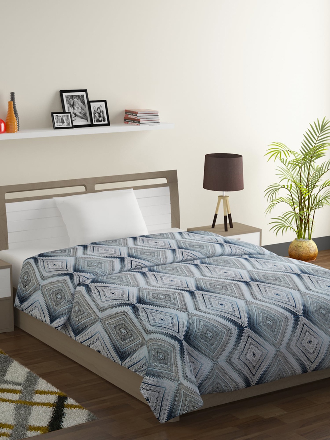 

SWAYAM Blue Geometric Mild Winter 150 GSM Single Bed Comforter