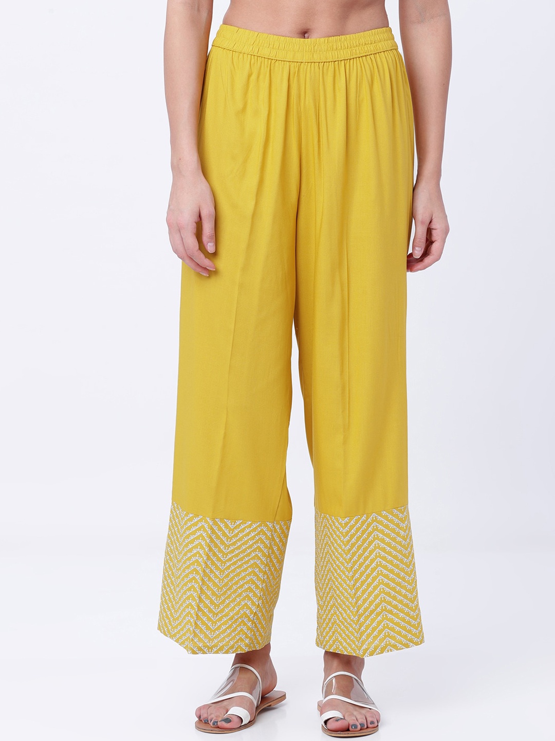 

Vishudh Women Mustard Yellow Solid Hem Design Straight Palazzos