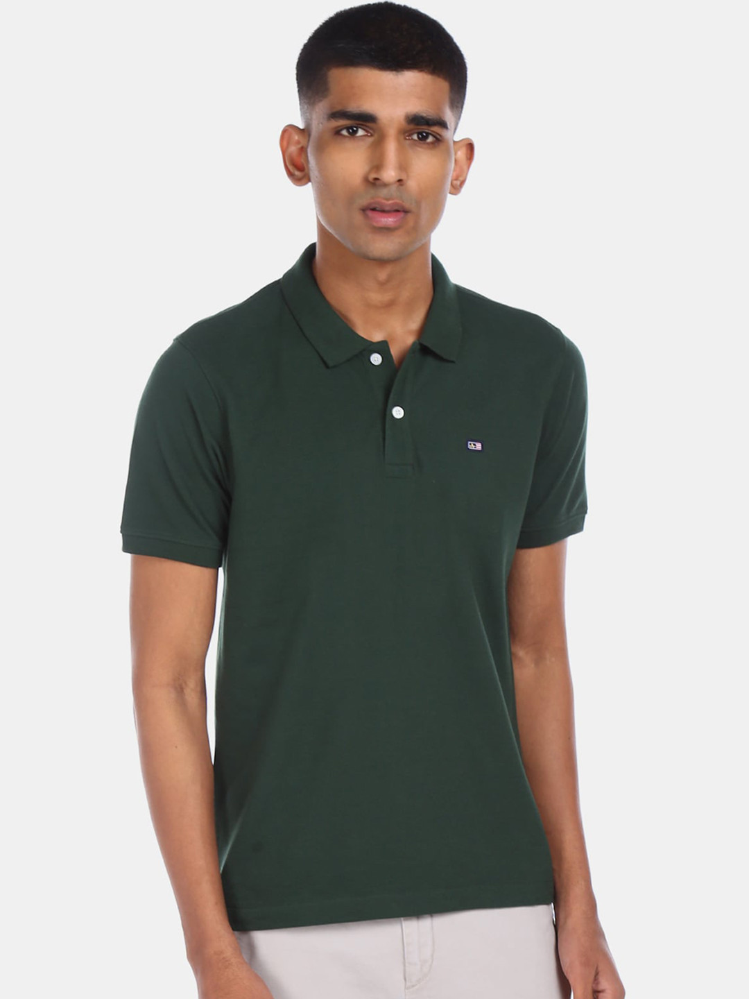 

Arrow Sport Men Green Solid Polo Collar T-shirt