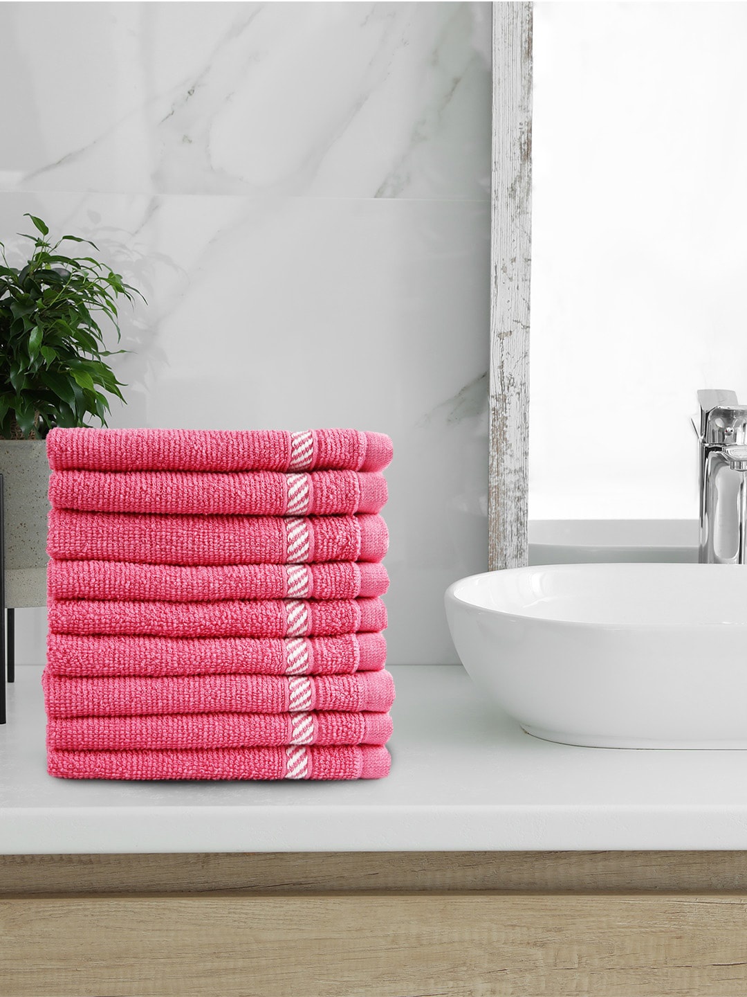 

Trident Set Of 9 Pink Solid 380 GSM Face Towels