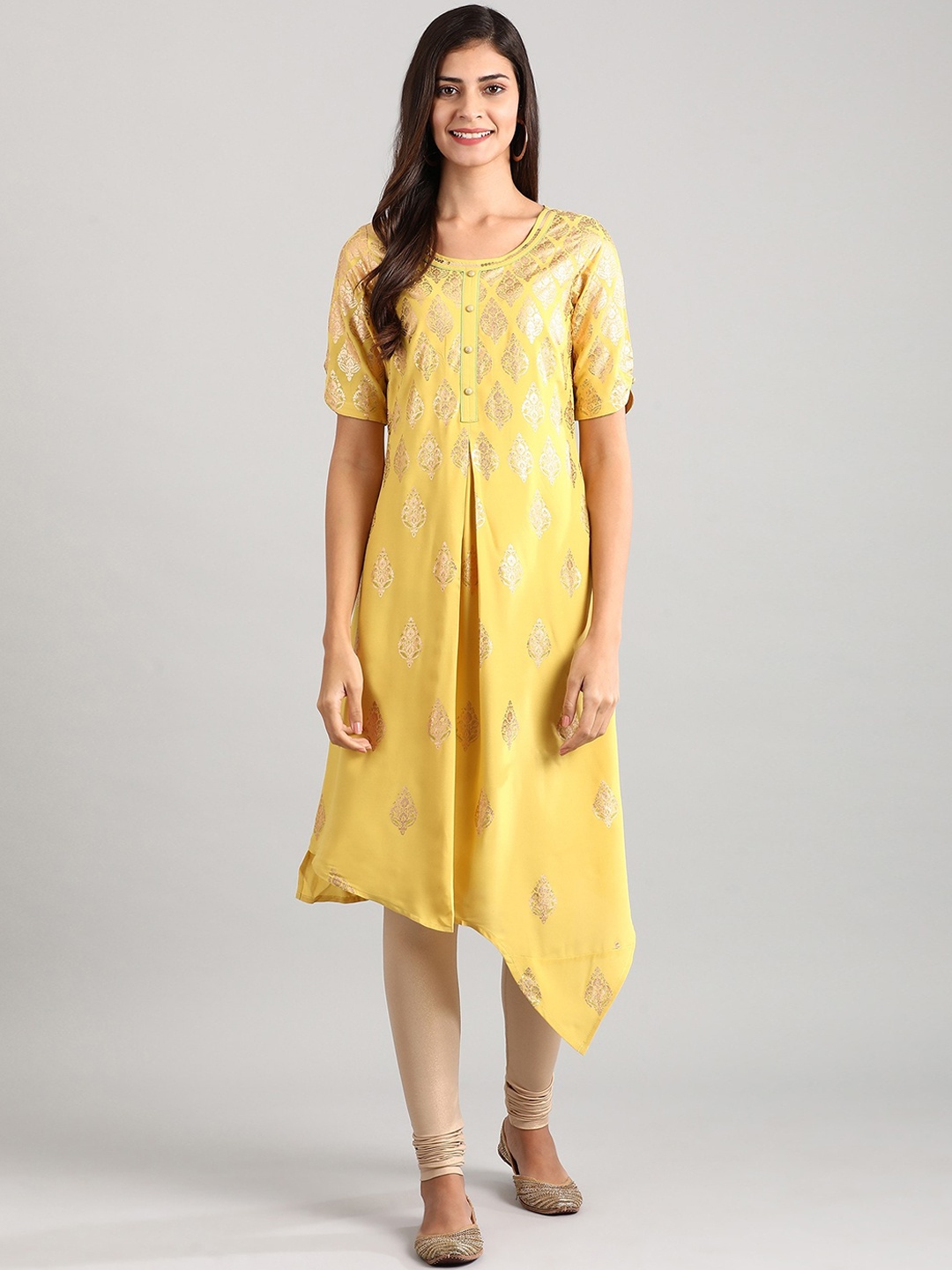 Aurelia Women Yellow Foil Printed Asymmetric Hem Kurta