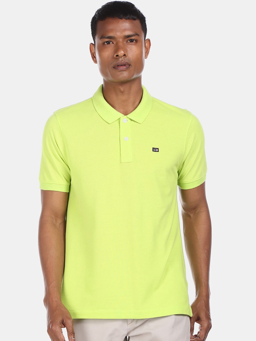 

Arrow Sport Men Green Solid Polo Collar T-shirt