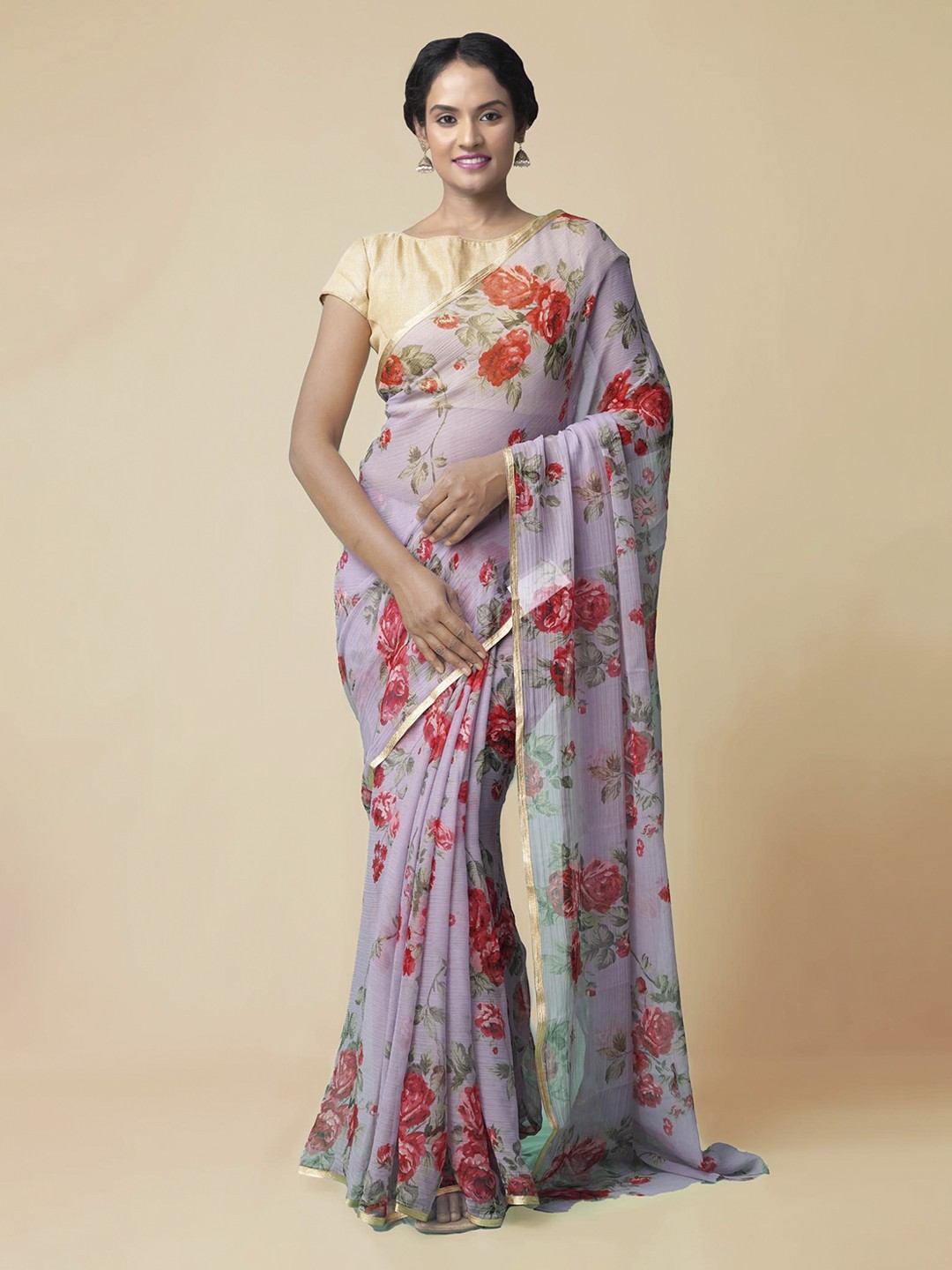 

Unnati Silks Violet Printed Patola Saree