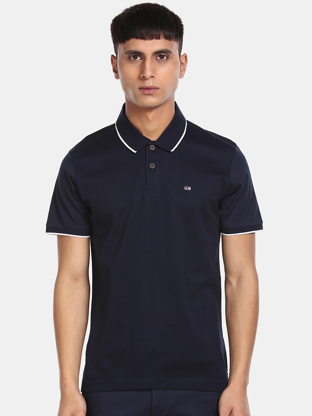 

Arrow Sport Men Blue Solid Polo Collar T-shirt