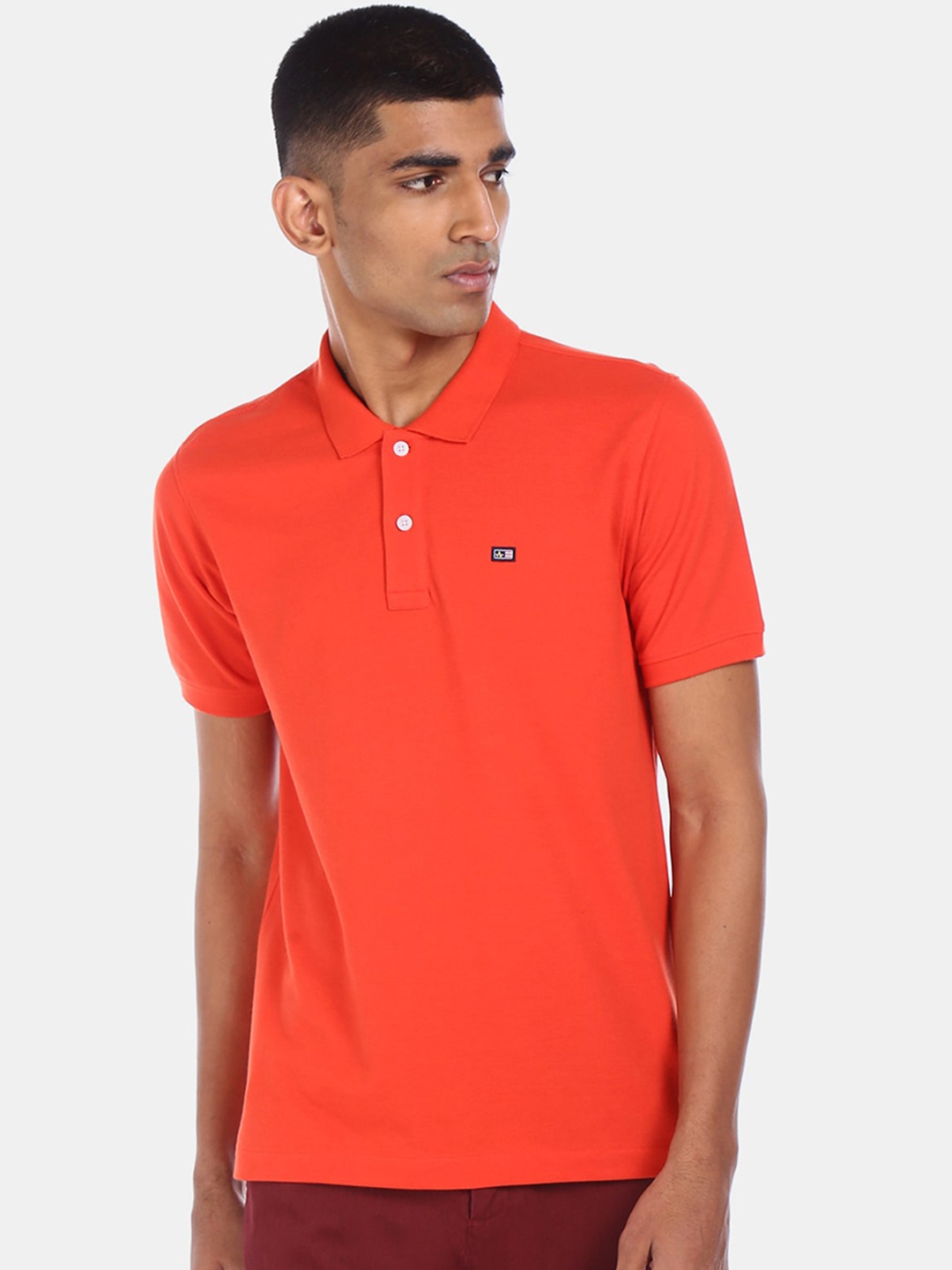

Arrow Sport Men Orange Solid Polo Collar T-shirt