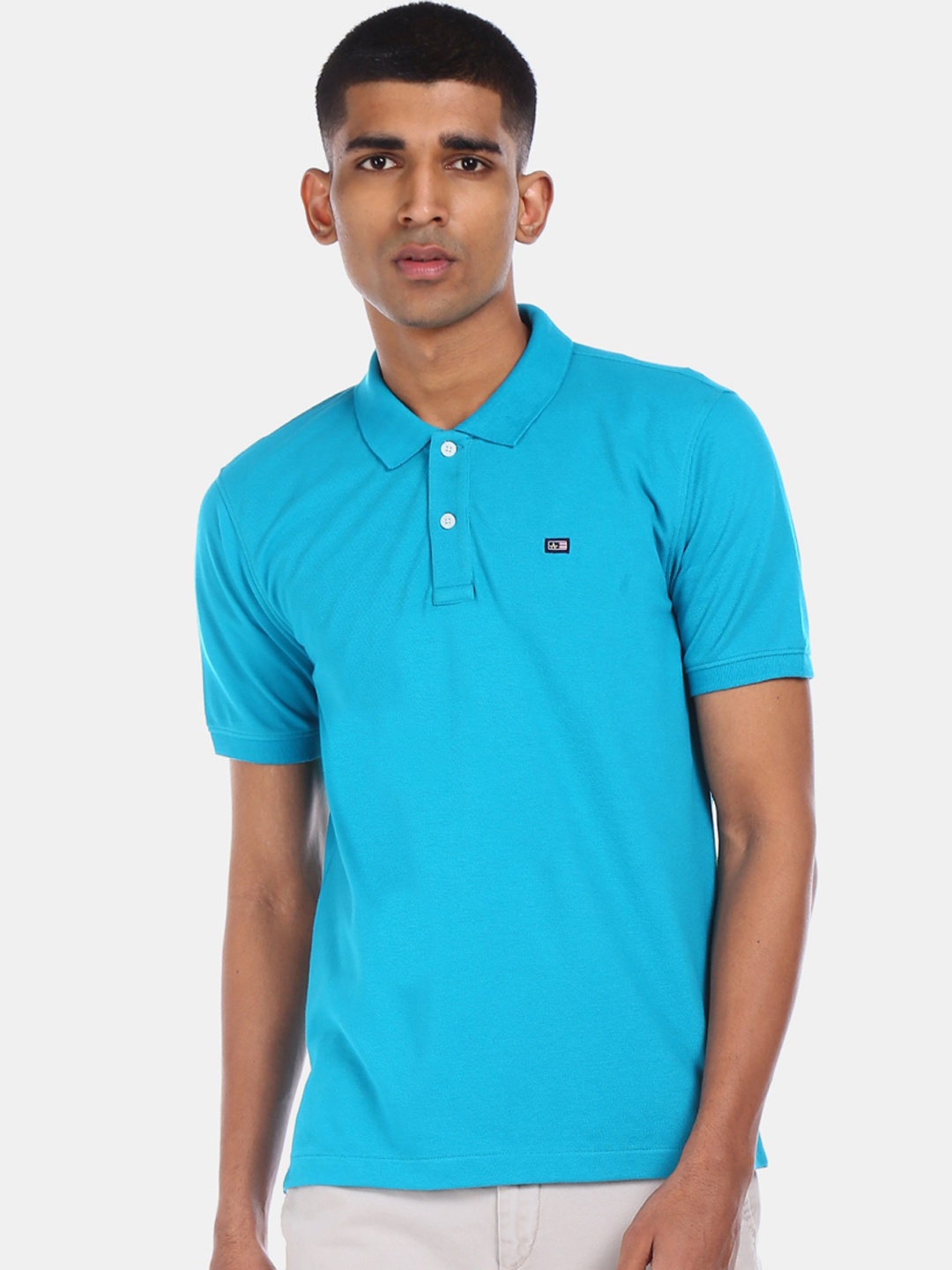 

Arrow Sport Men Blue Solid Polo Collar T-shirt