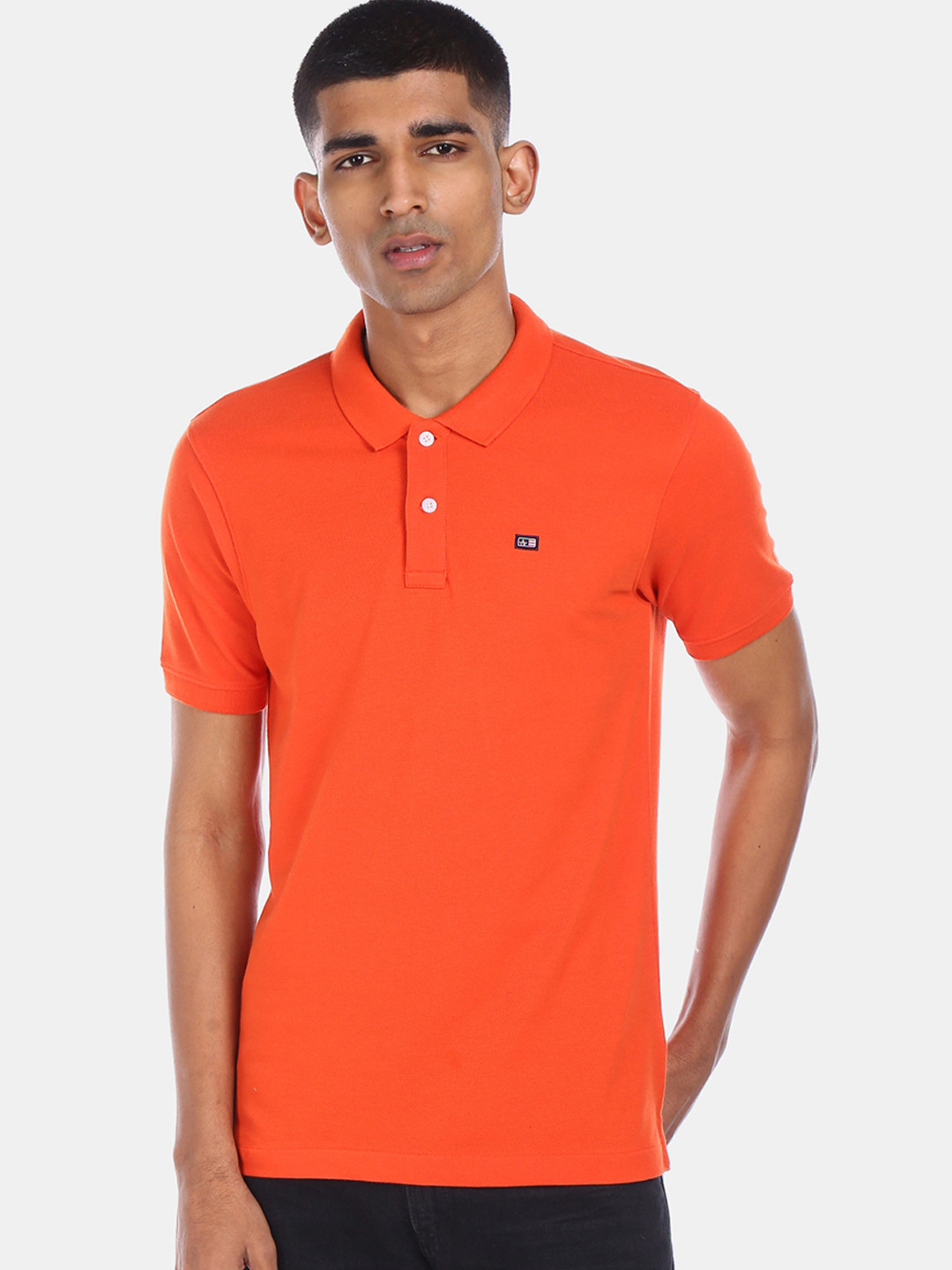 

Arrow Sport Men Orange Solid Polo Collar T-shirt