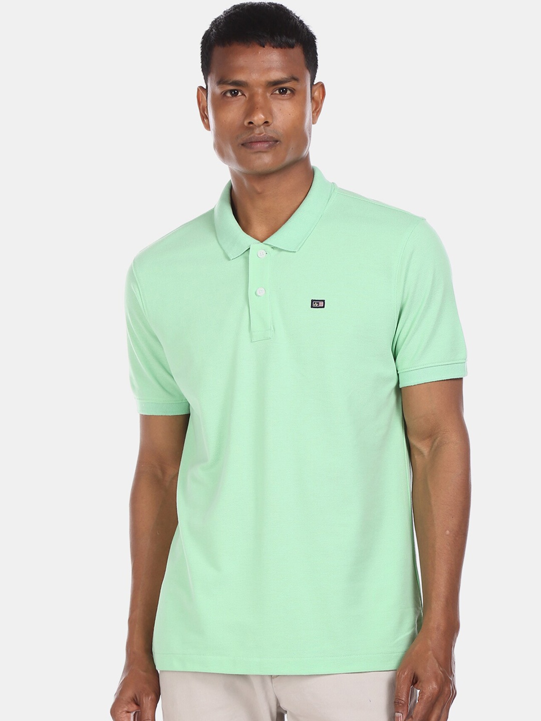 

Arrow Sport Men Green Solid Polo Collar T-shirt