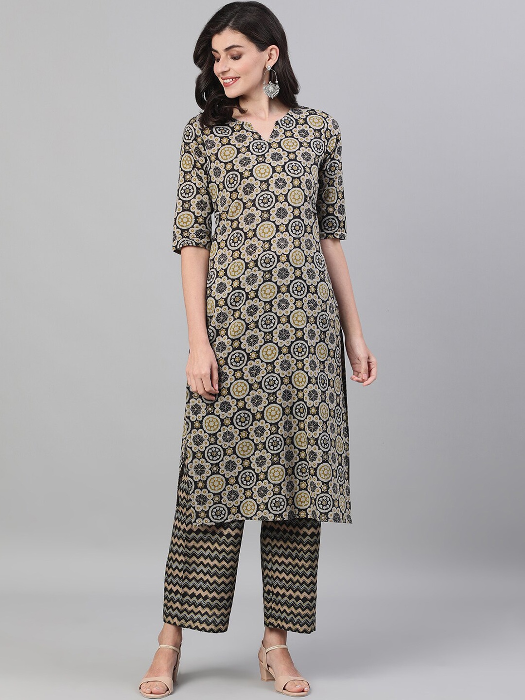 

Nayo Women Black Printed Kurti with Palazzos