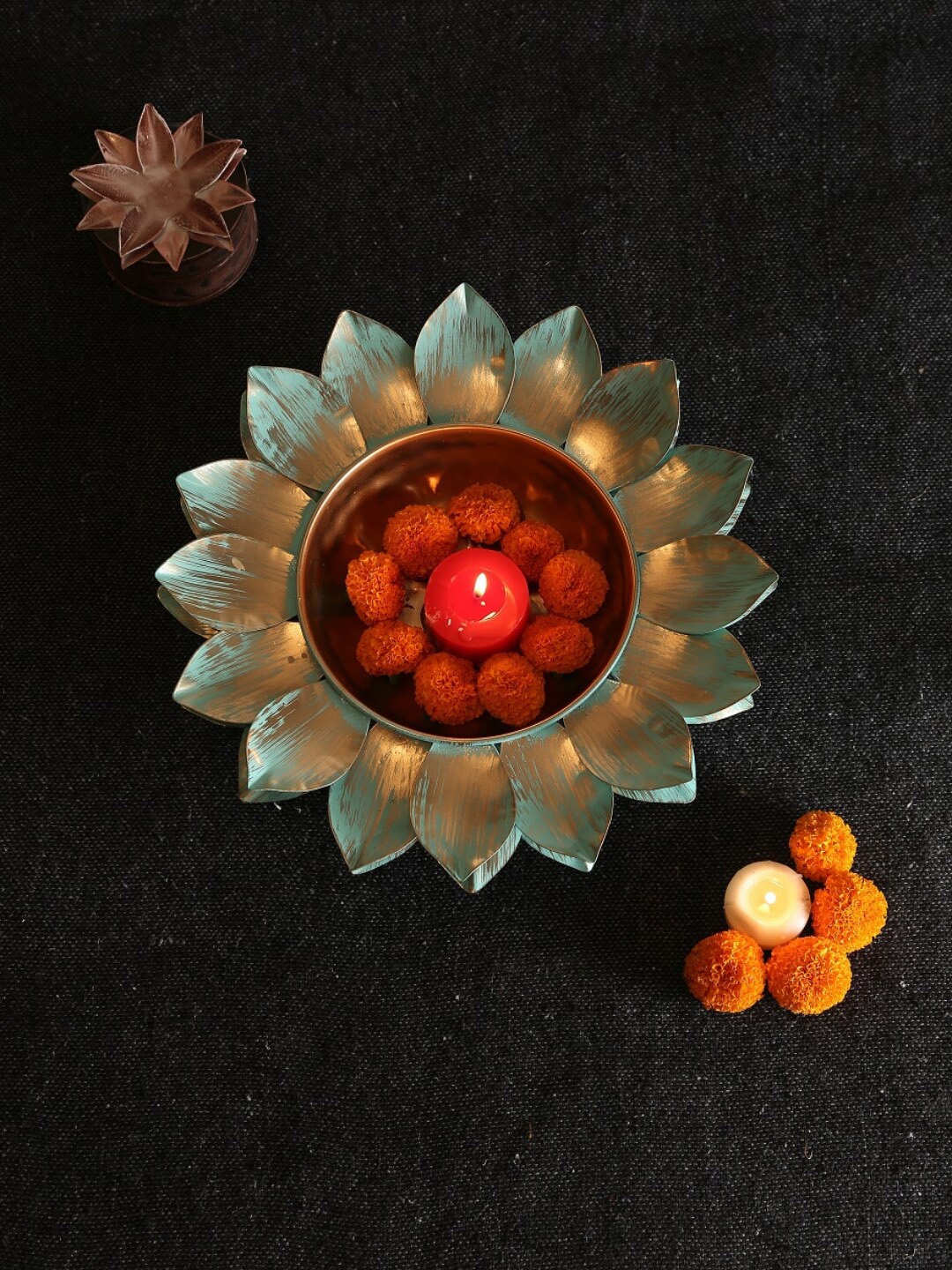 

Amoliconcepts Gold-Toned & Blue Lotus Design Urli