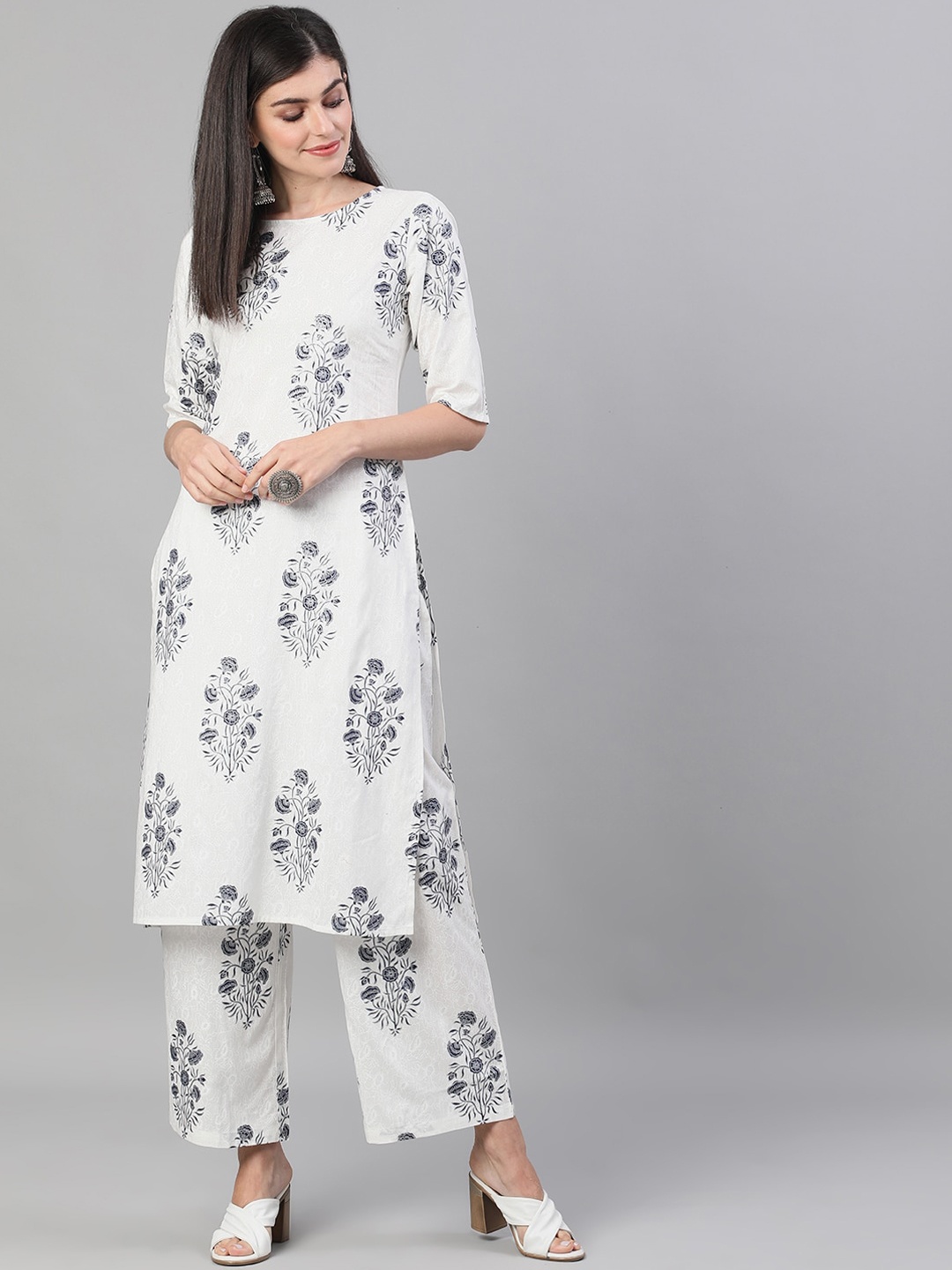 

Nayo Women White & Navy Blue Embroidered Kurta with Trousers