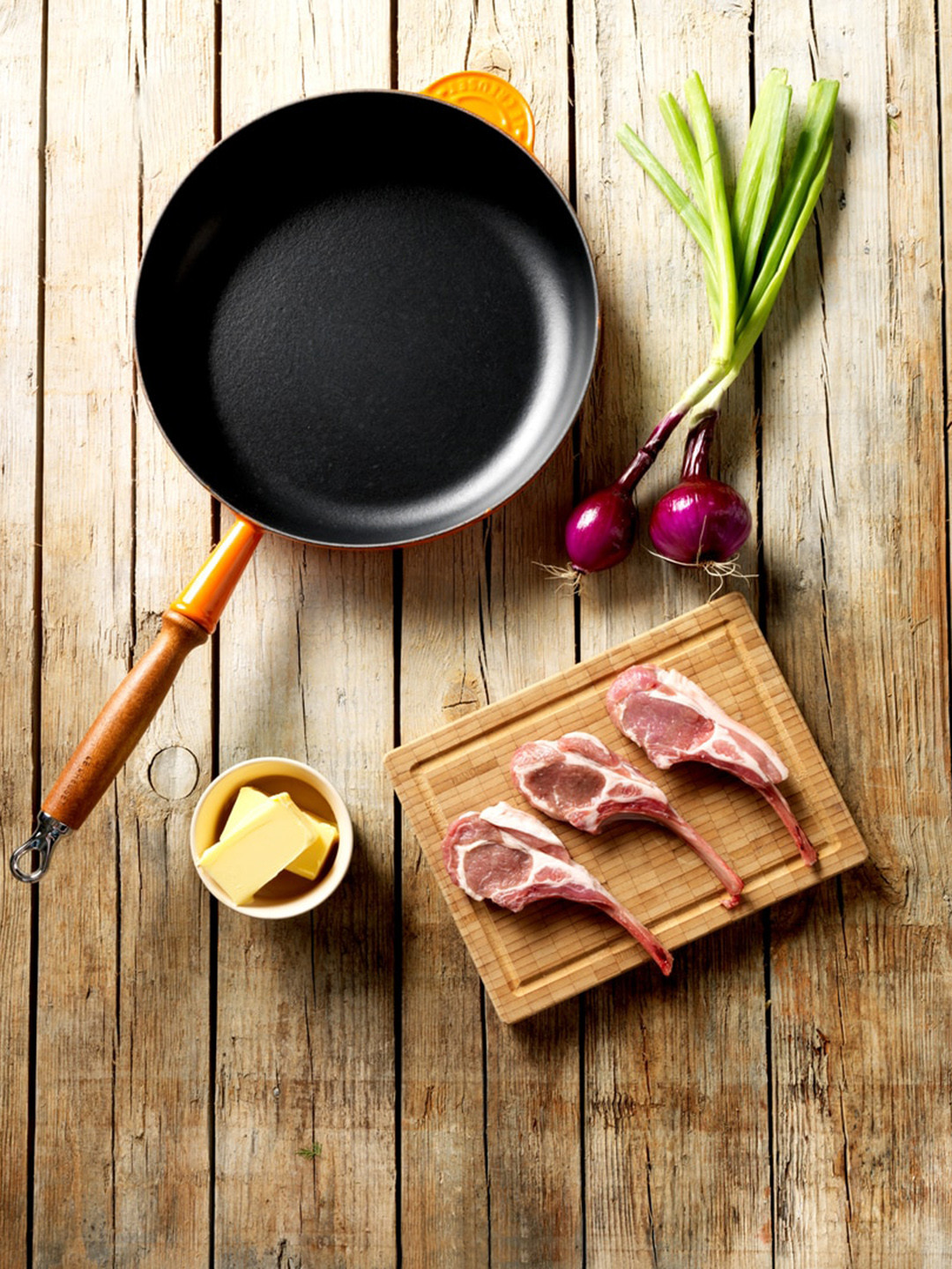

LE CREUSET Orange & Black Frying Pan With Wooden Handle 26 cm