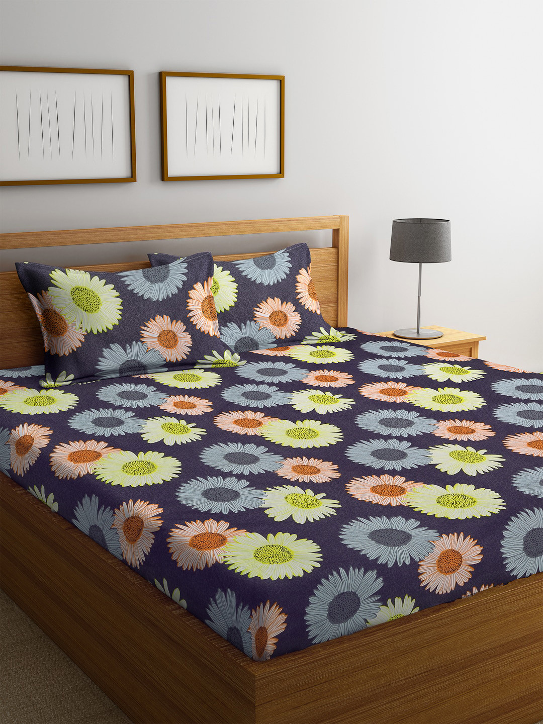 

Home Sizzler Blue & Yellow Floral 144 TC Polyester 1 Queen Bedsheet with 2 Pillow Covers