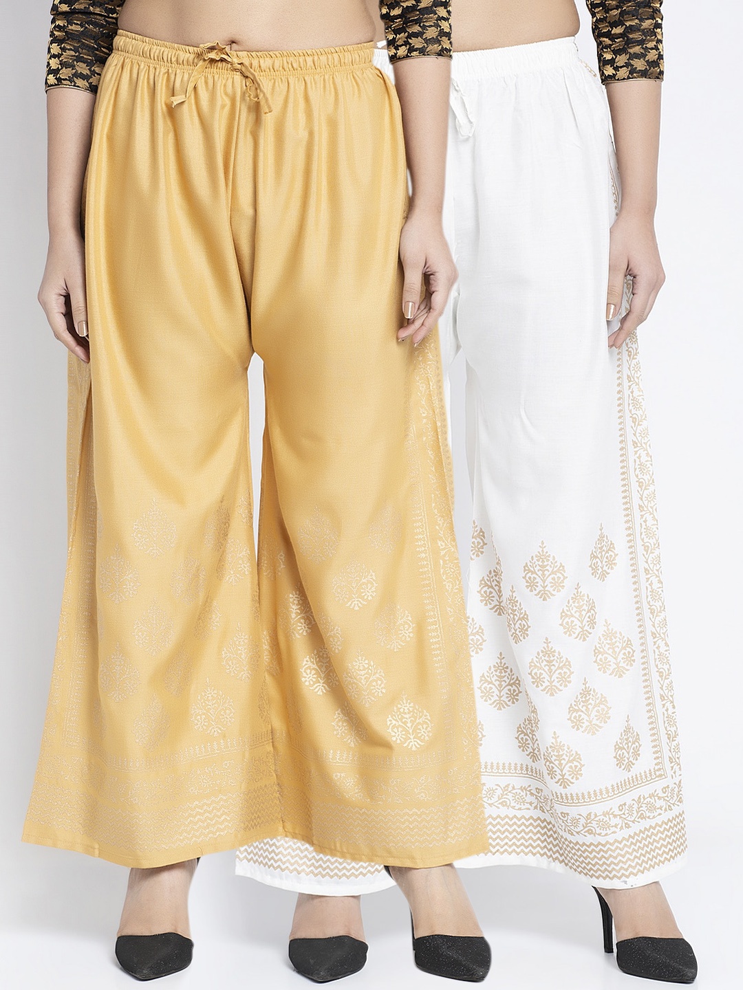 

GRACIT Women Beige Solid Flared Palazzos