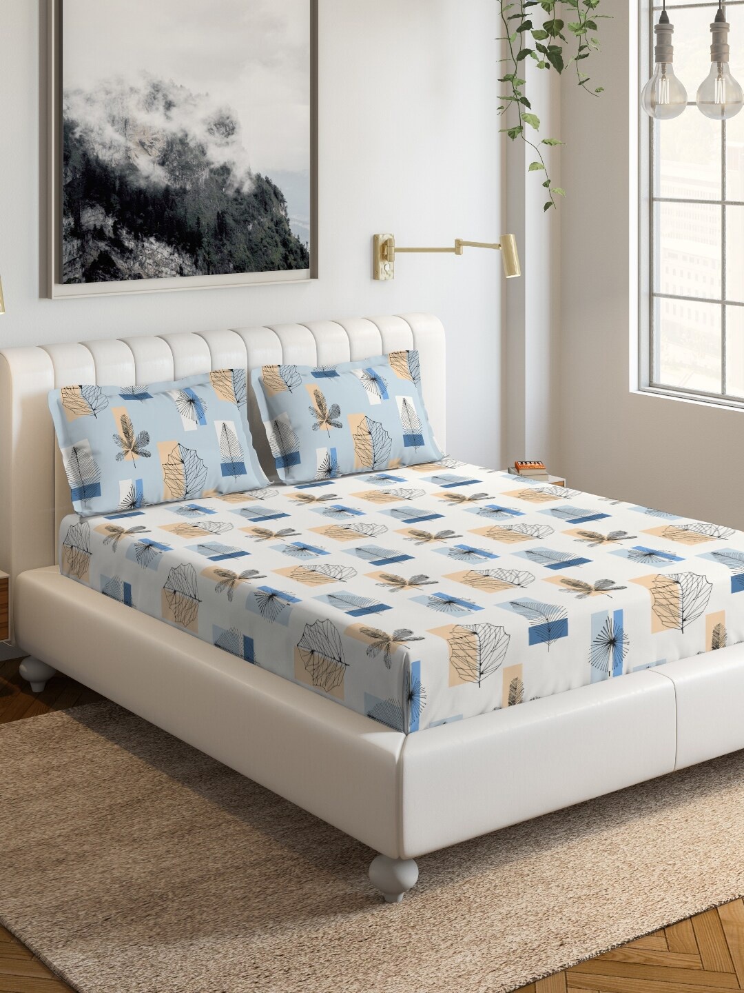 

DDecor Blue & Black Floral 144 TC Cotton 1 Queen Bedsheet with 2 Pillow Covers
