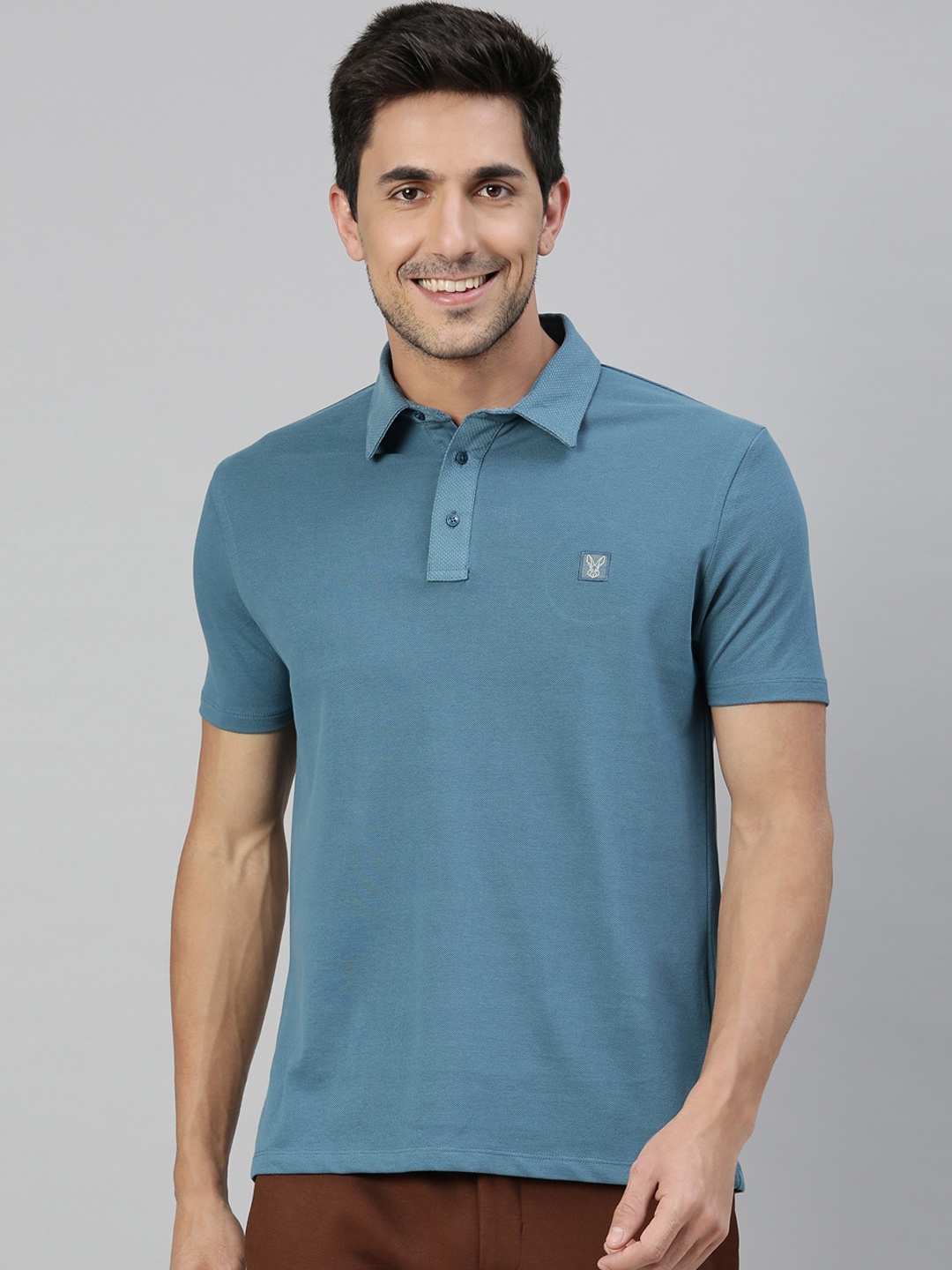 

RARE RABBIT Men Blue Solid Polo Collar T-shirt