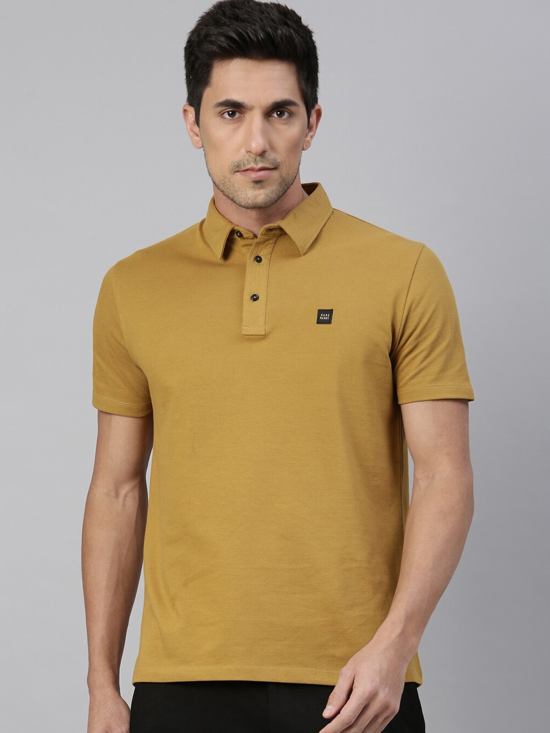 

RARE RABBIT Men Mustard Solid Polo Collar T-shirt