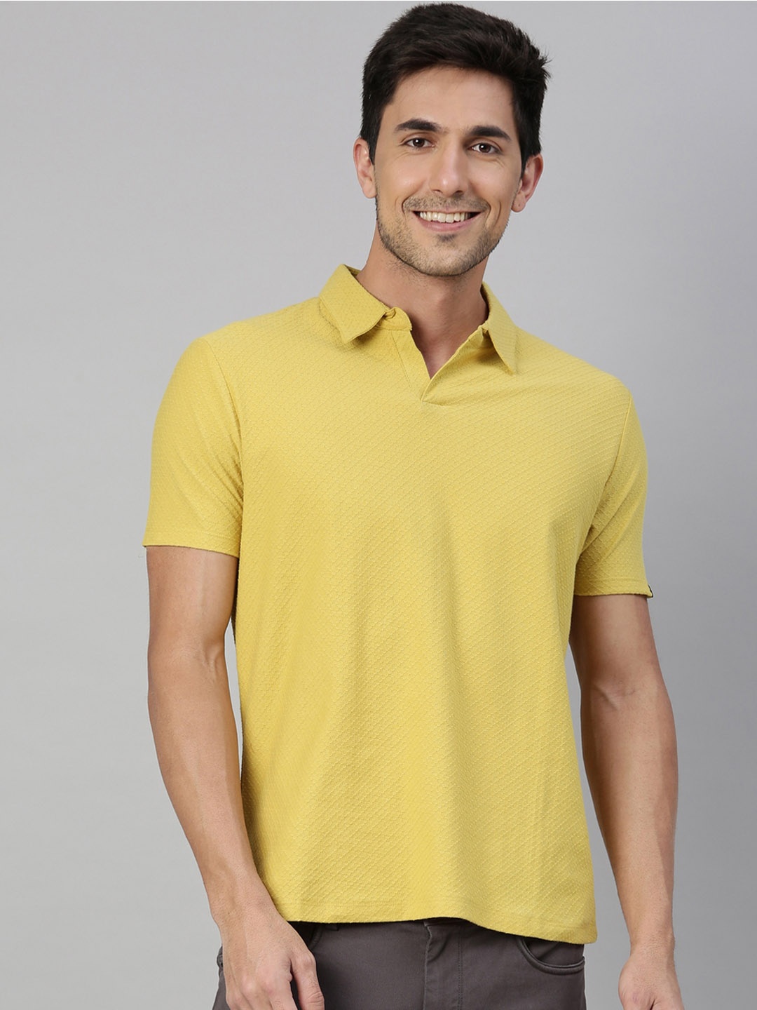 

RARE RABBIT Men Yellow Solid Polo Collar T-shirt