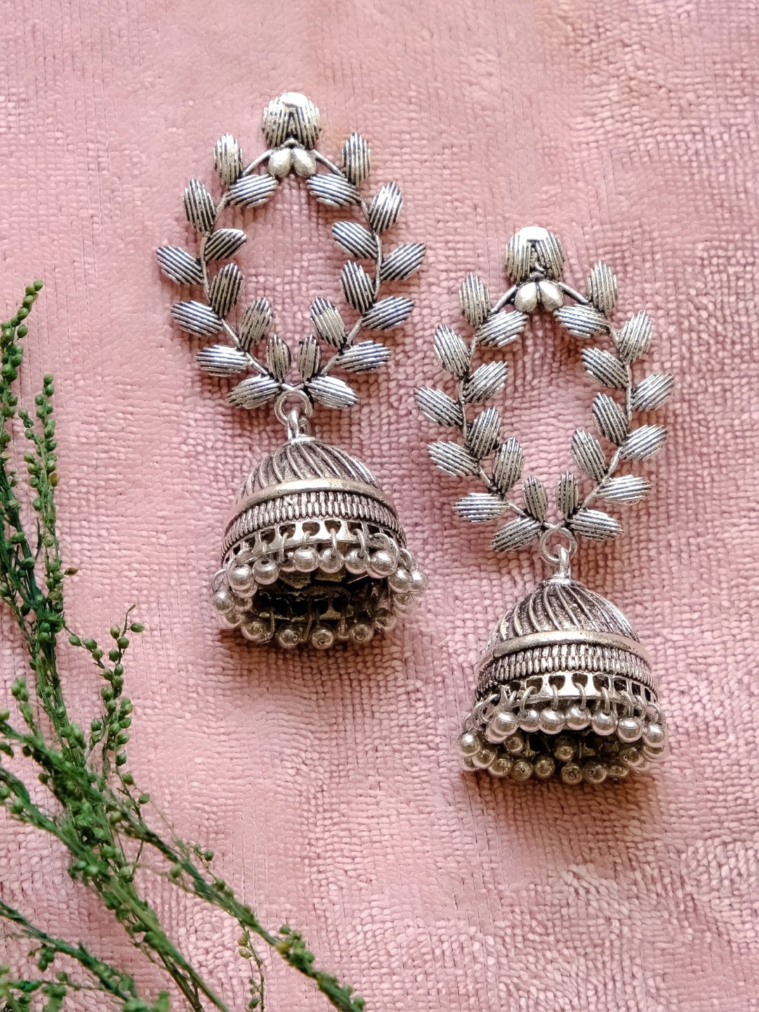 

Crunchy Fashion Silver-Toned Contemporary Jhumkas