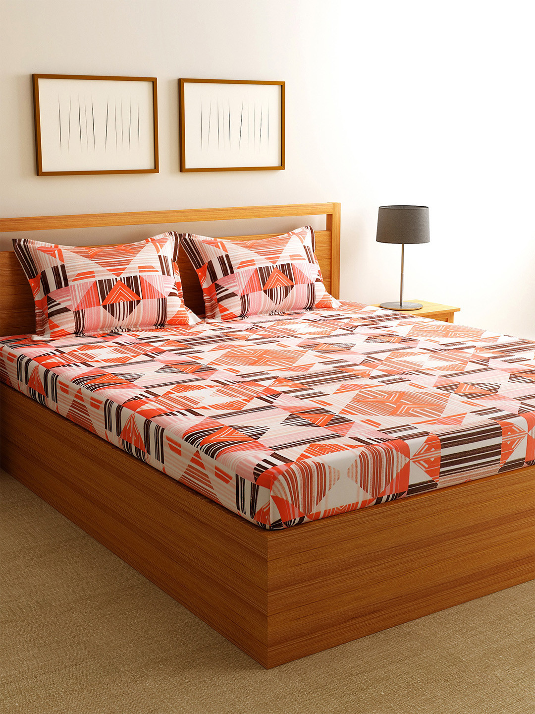 

Florida Orange & Peach-Coloured Geometric 144 TC Cotton 1 King Bedsheet with 2 Pillow Covers