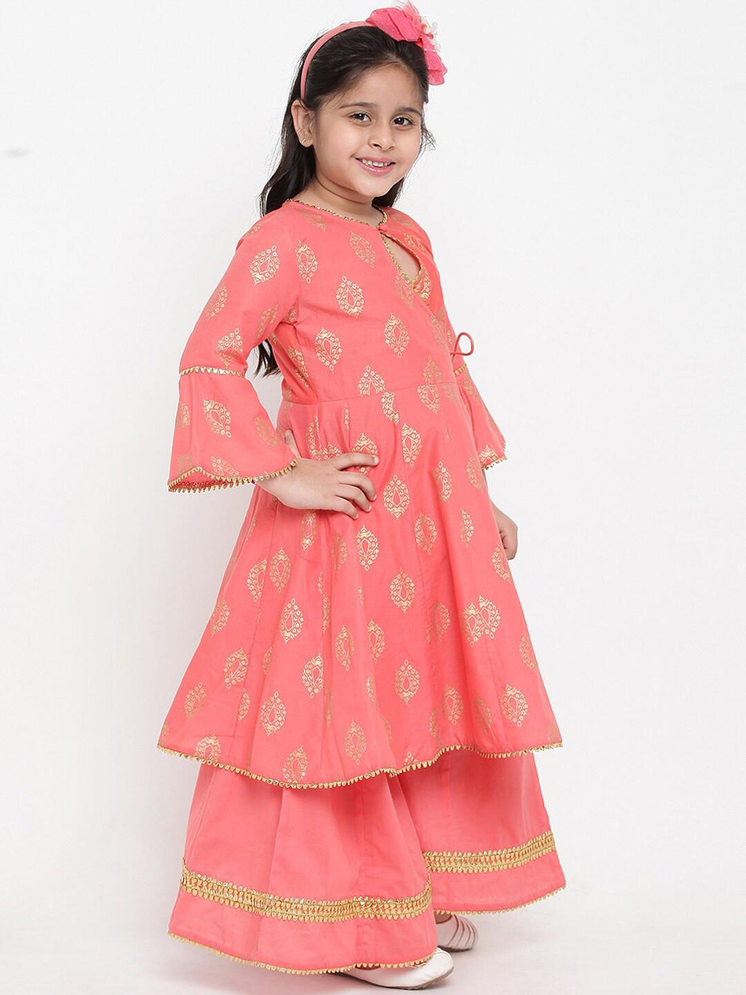 

Bitiya by Bhama Girls Peach-Coloured Woven Design Kurti with Palazzos