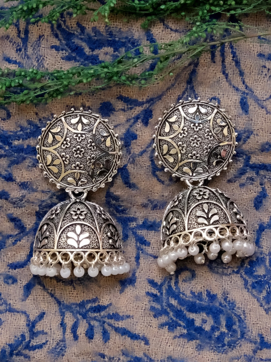 

Crunchy Fashion Silver-Toned Contemporary Jhumkas