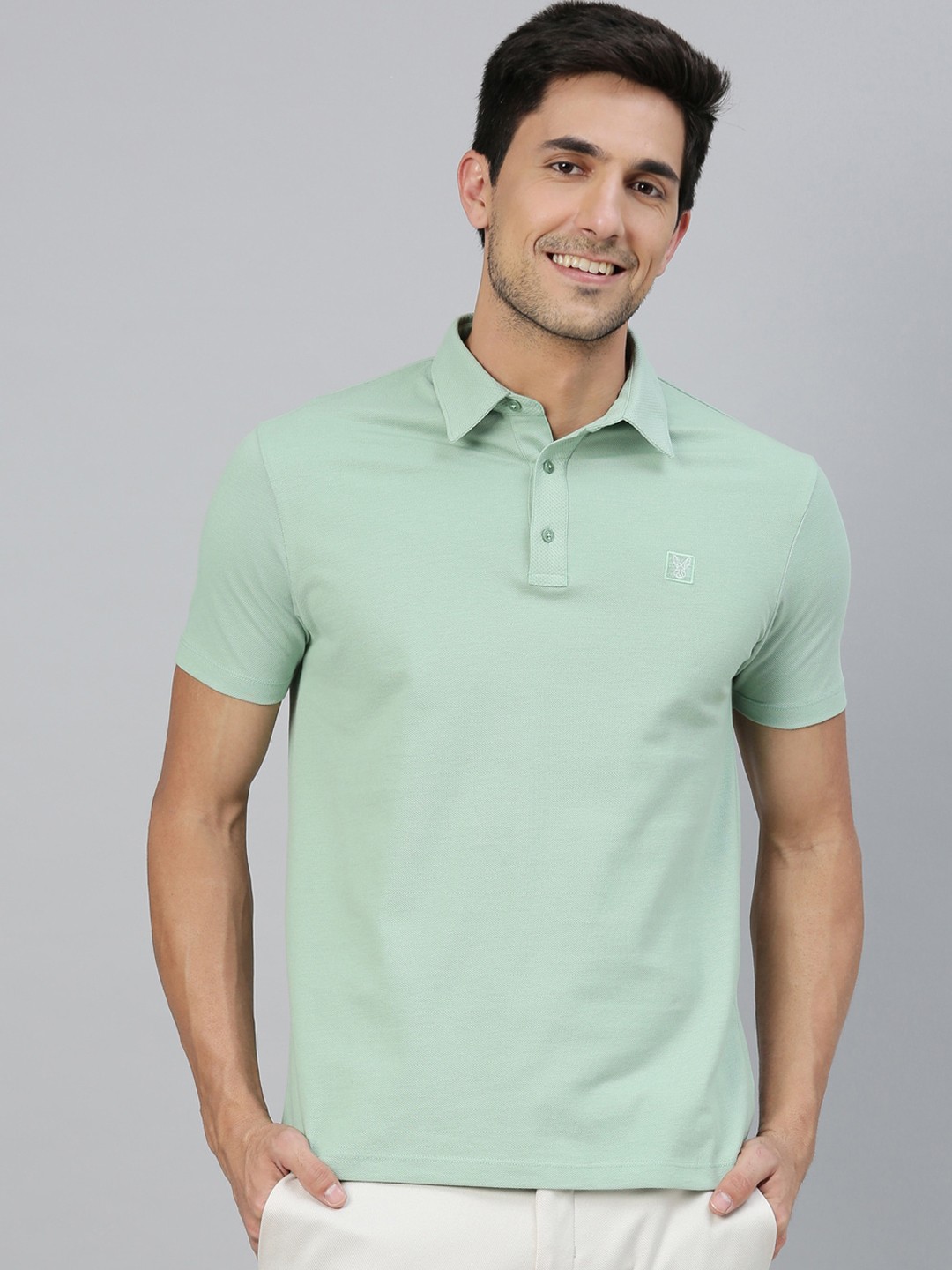 

RARE RABBIT Men Green Solid Polo Collar T-shirt