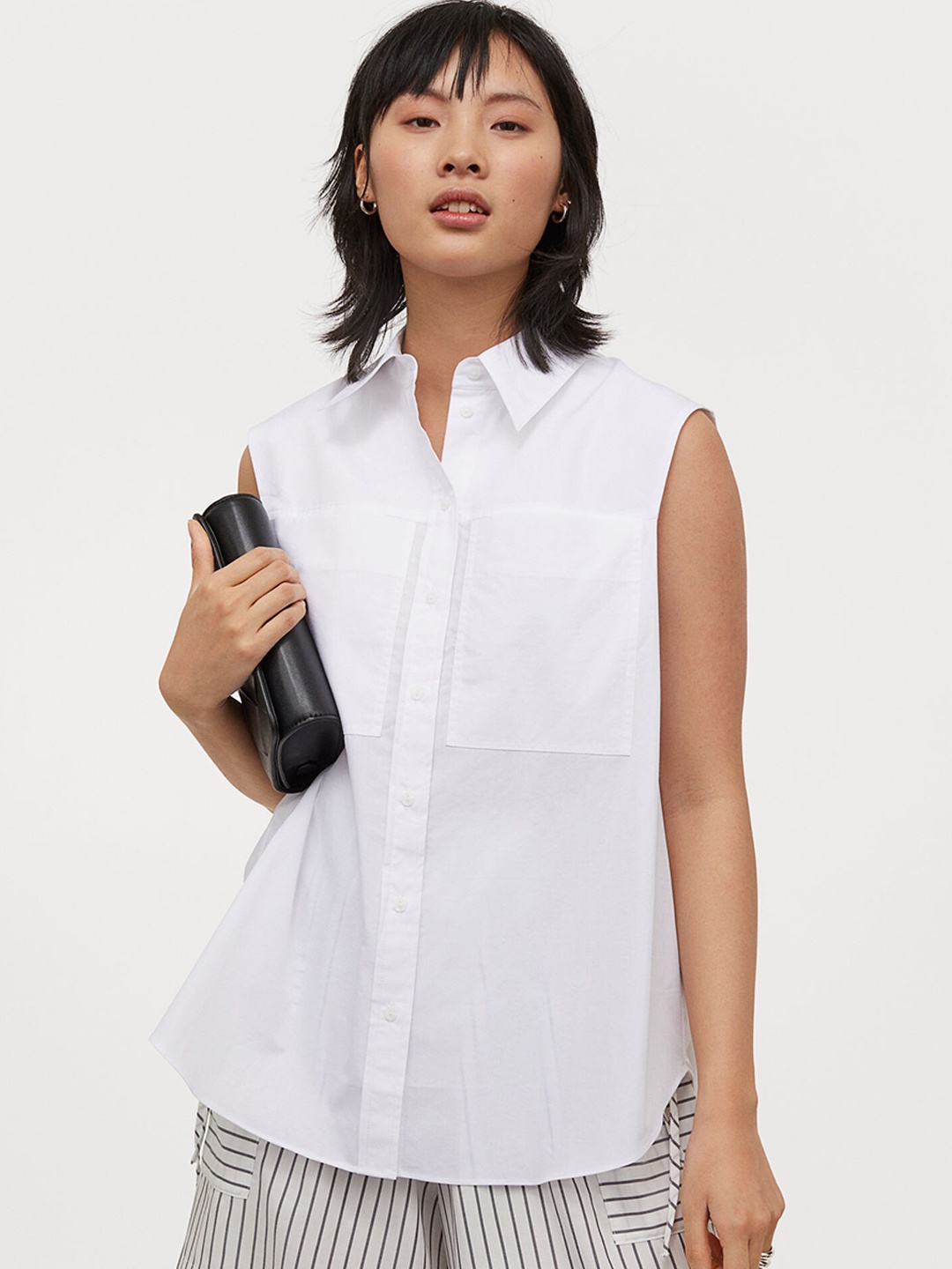 

H&M Women White Cotton Sleeveless Shirt With Large Chest Pockets