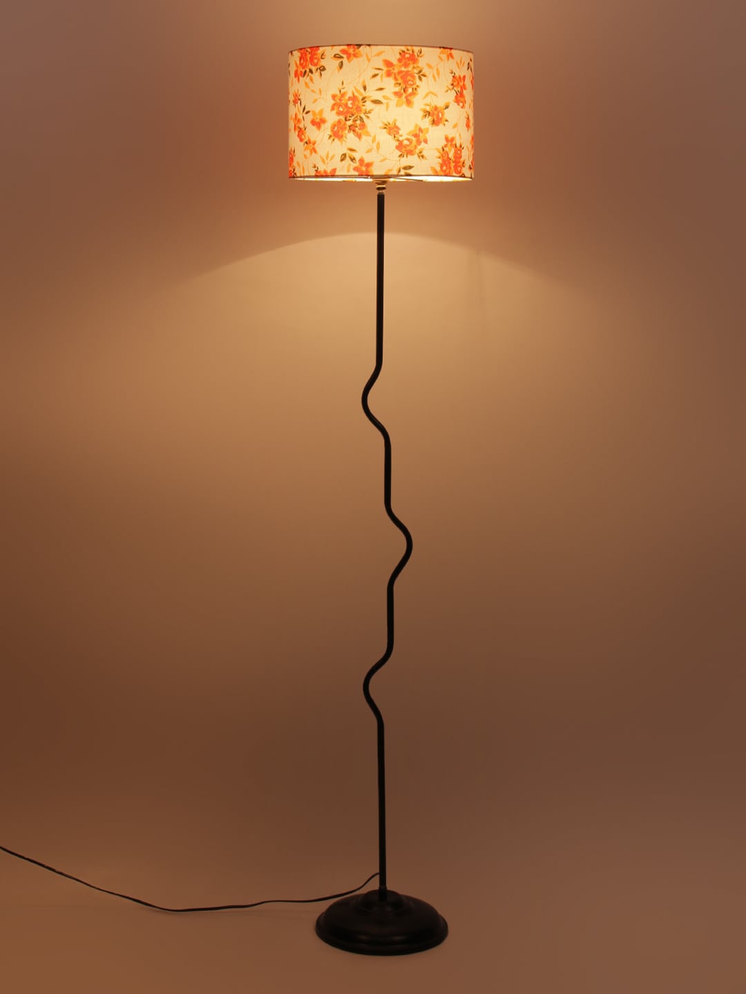 

Devansh White & Orange Solid Curvy Novelty Lamp