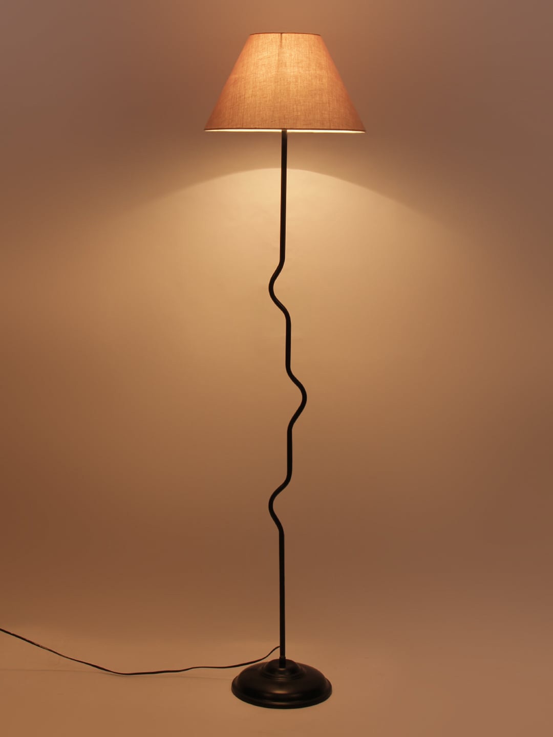 

Devansh Grey Solid Curvy Novelty Lamp