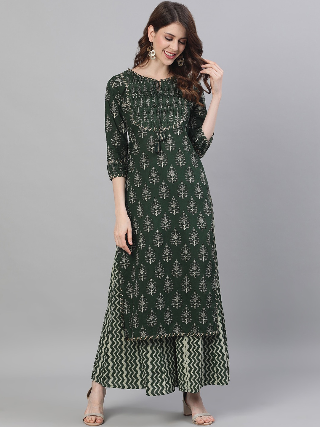 

Ishin Women Green & Off-White Printed Kurta with Palazzos