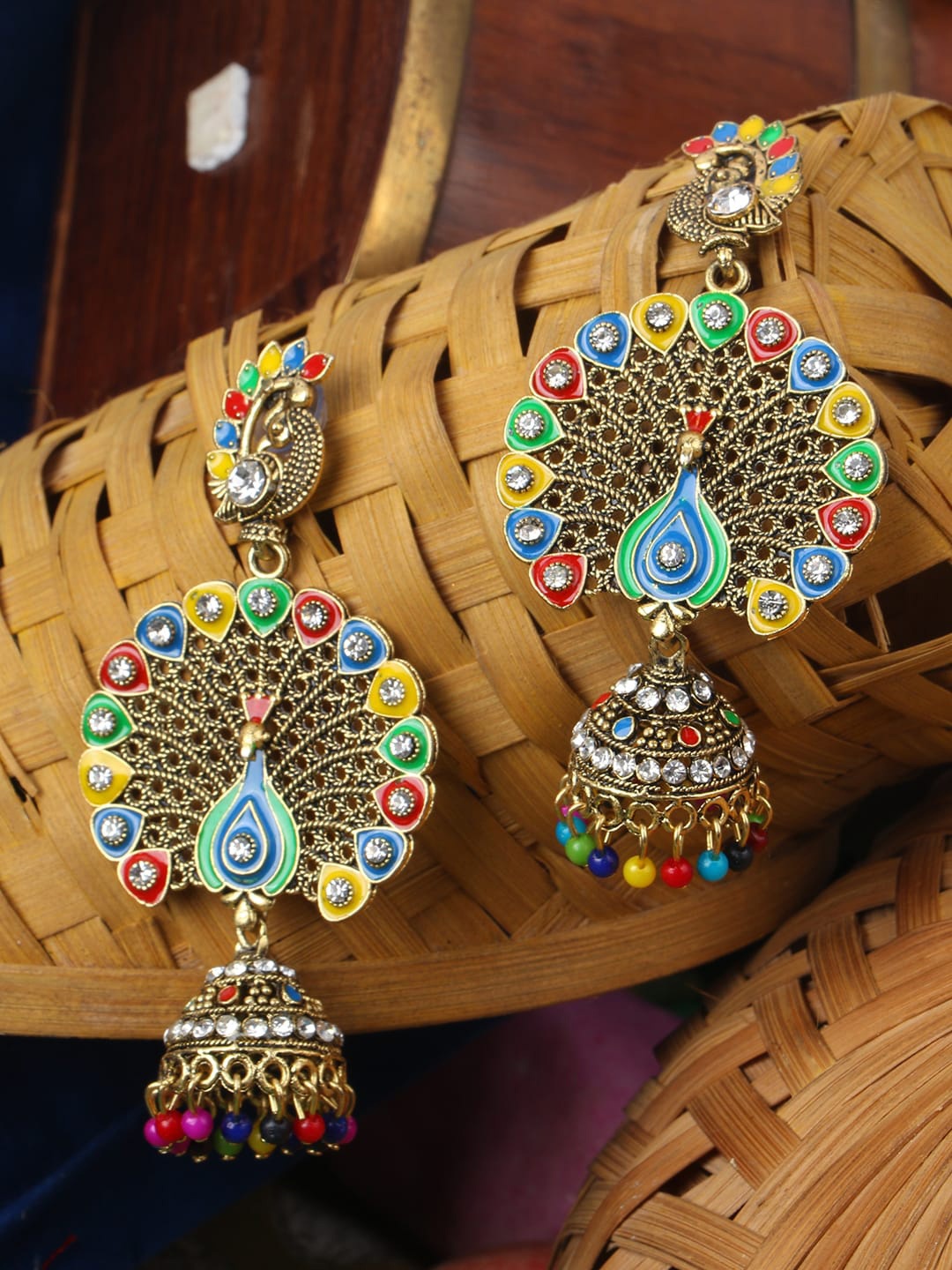 ANIKAS CREATION Blue & Red Gold-Plated Peacock Shaped Jhumkas