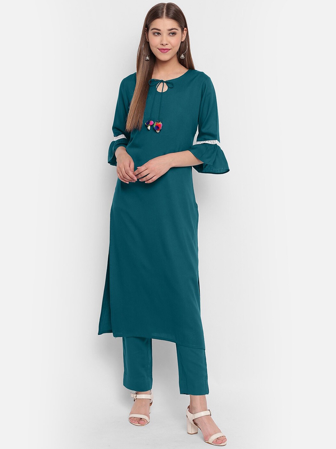 

Janasya Women Green Solid Kurta with Trousers