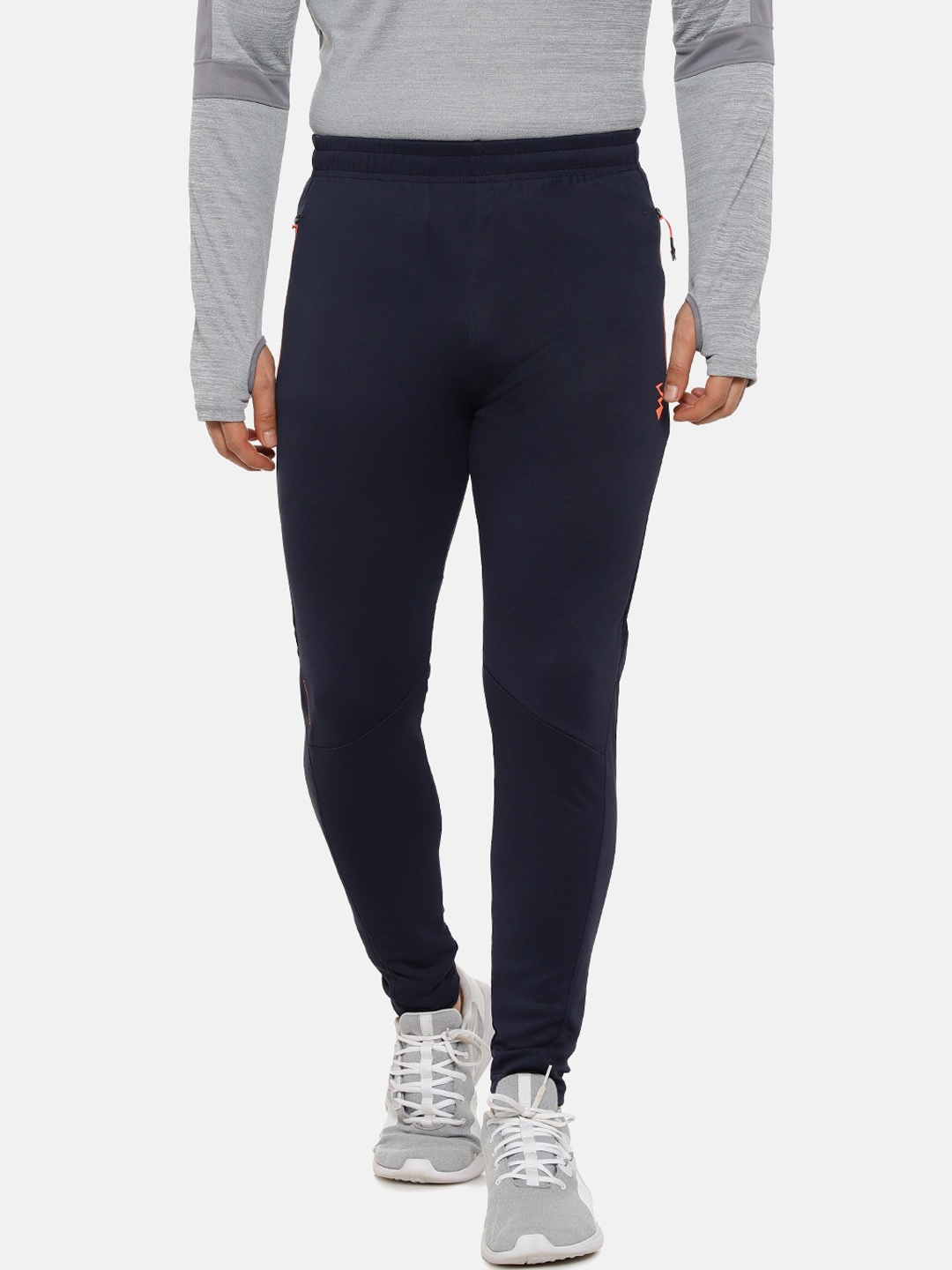 

Campus Sutra Men Blue Solid Sports Trackpants