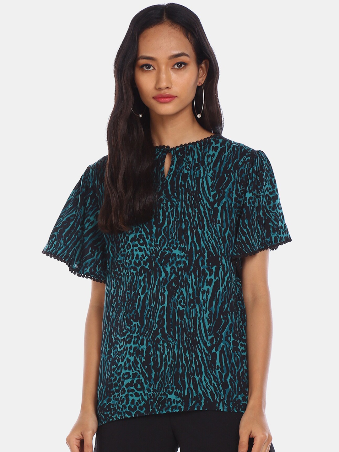 

Cherokee Teal Blue Animal Printed Top
