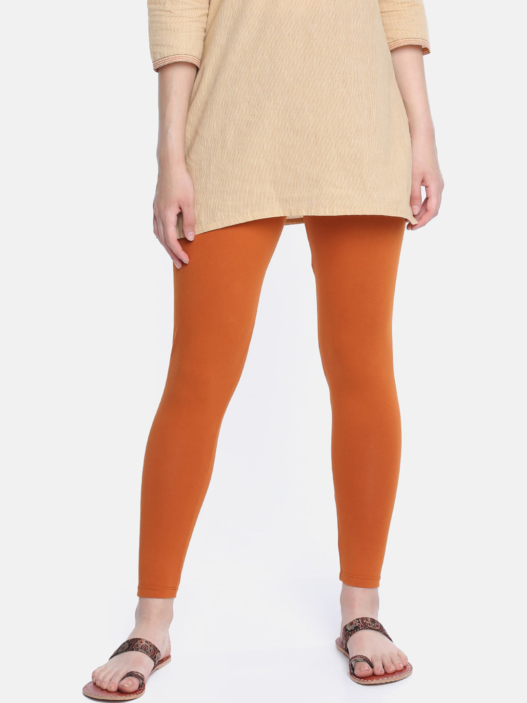 

Dollar Missy Women Rust Orange Solid Ankle-Length Leggings