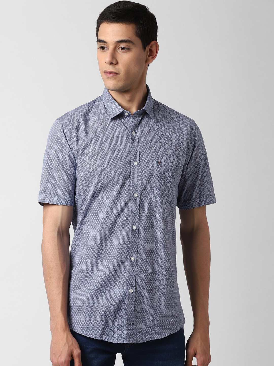 

Peter England Casuals Men Blue Slim Fit Solid Casual Shirt