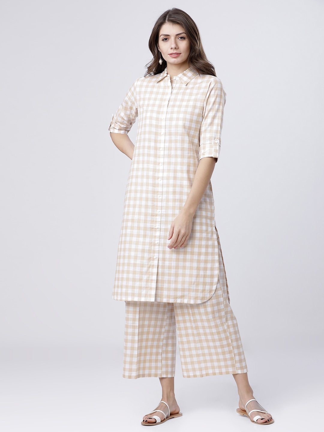 

Vishudh Women Beige & White Checked Kurta with Palazzos