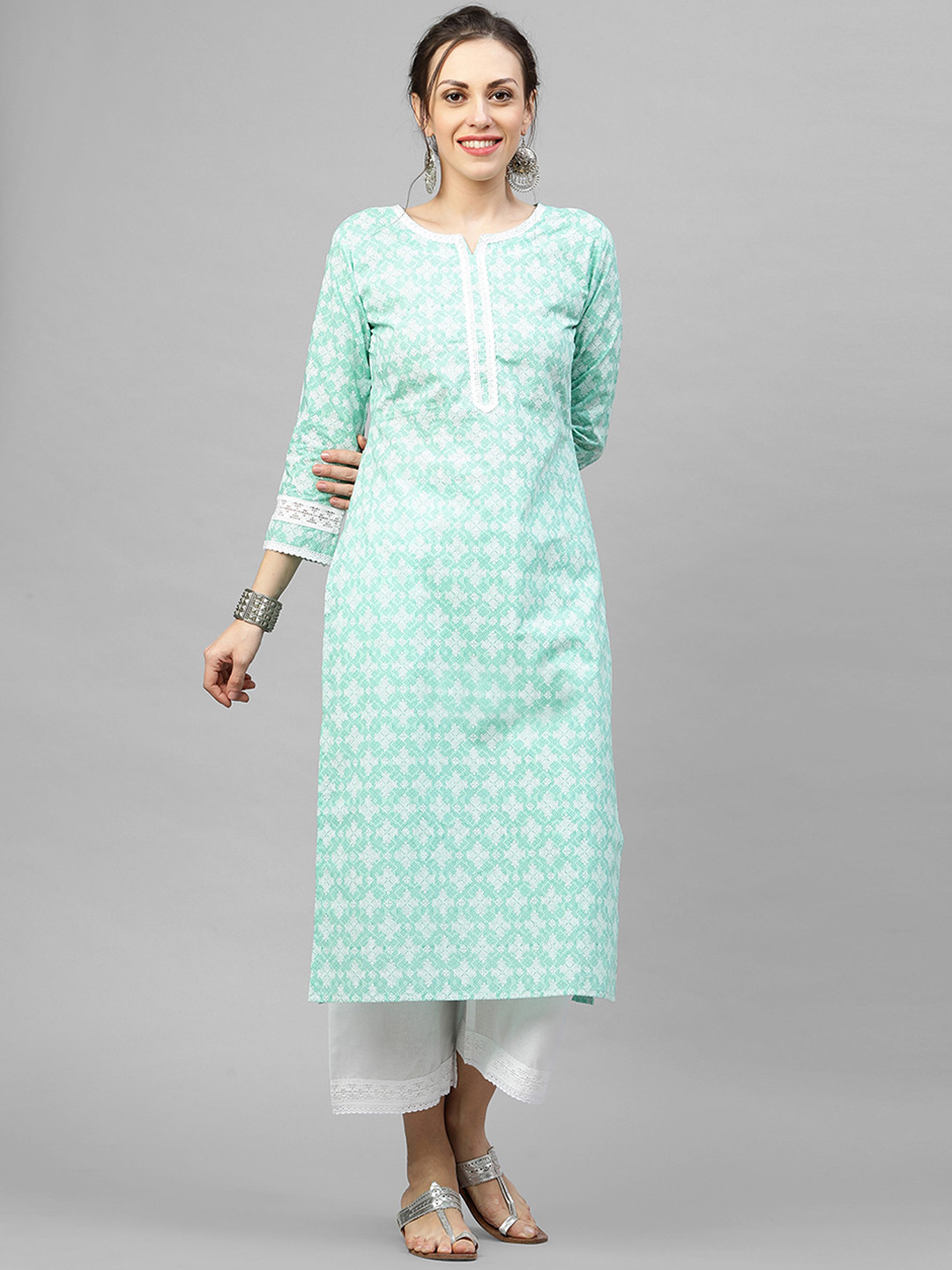 

Indo Era Women Sea Green Printed Kurti with Trousers