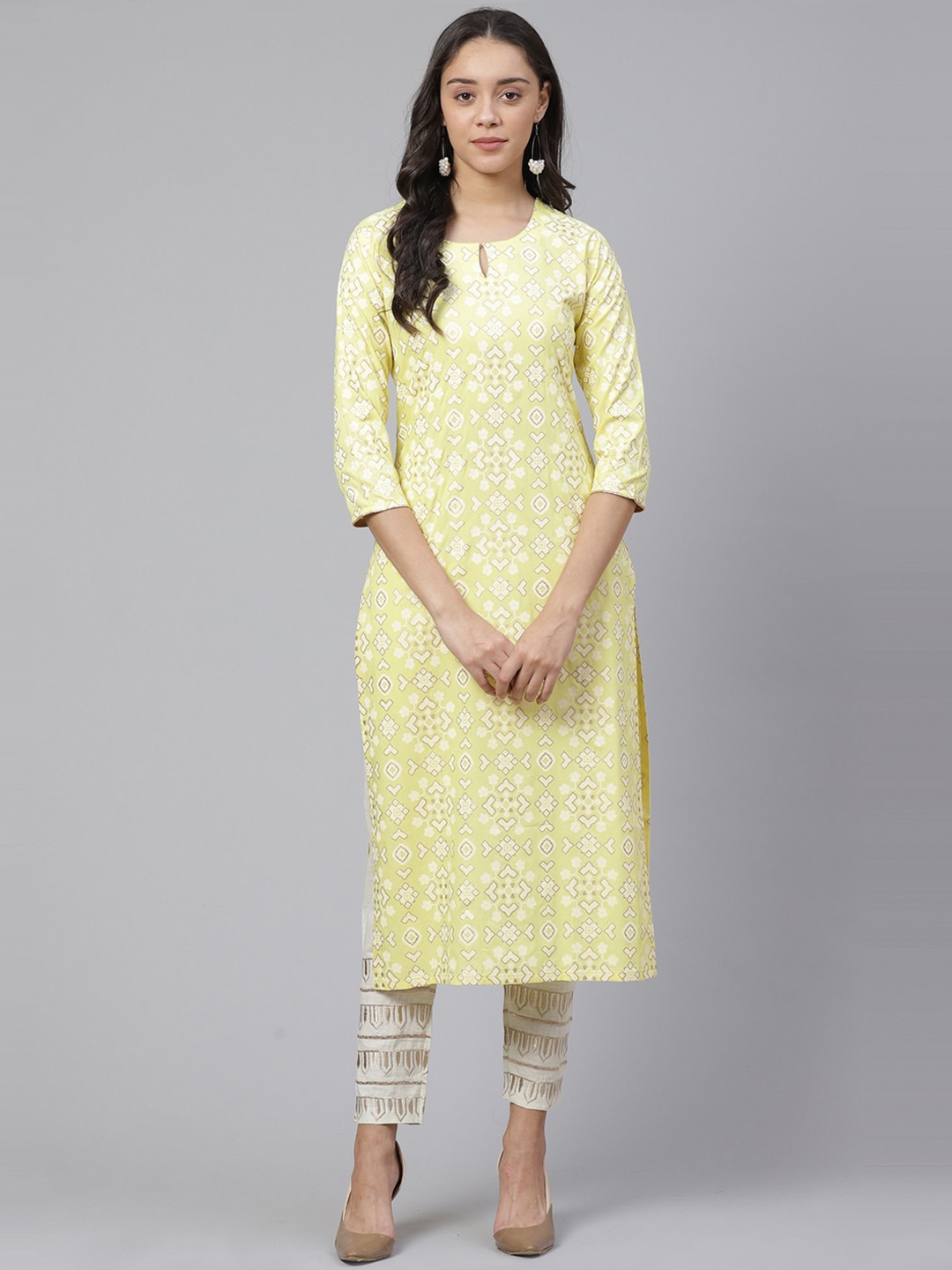 

Indo Era Women Yellow Printed Straight Kurta
