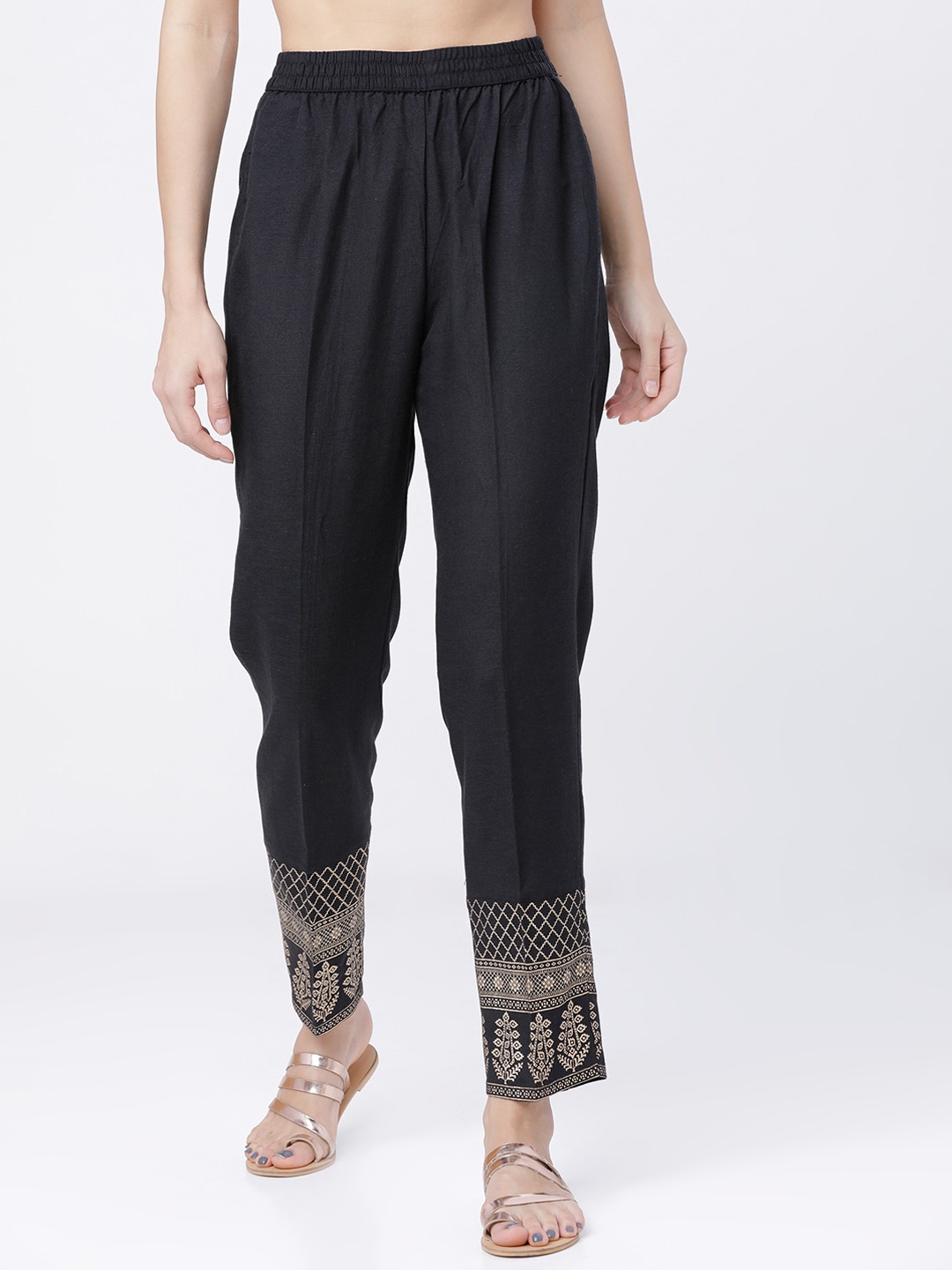 

Vishudh Women Black Regular Fit Printed Regular Trousers